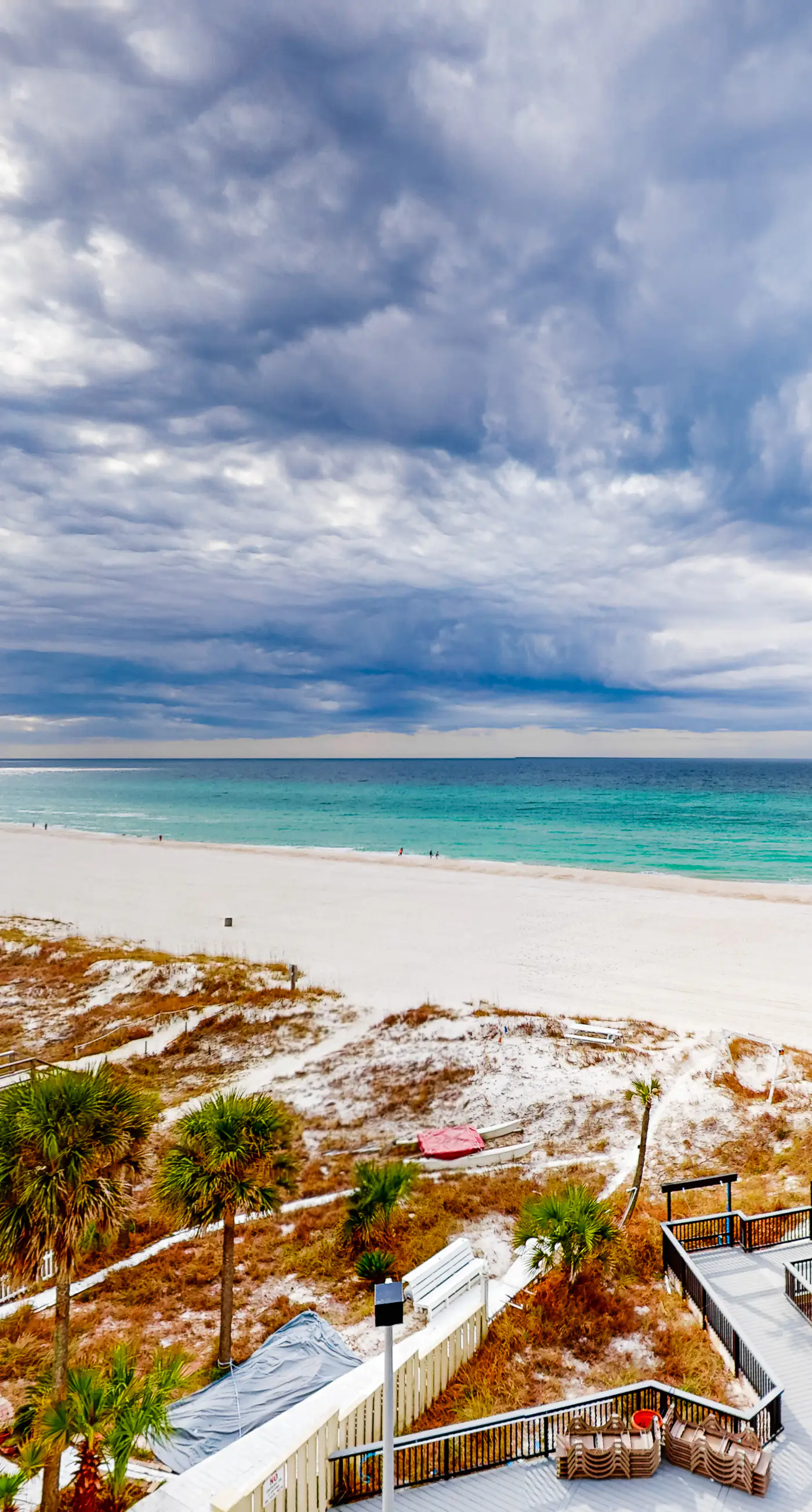 Beachfront condo with a private balcony, three pools, tennis, & picnic area