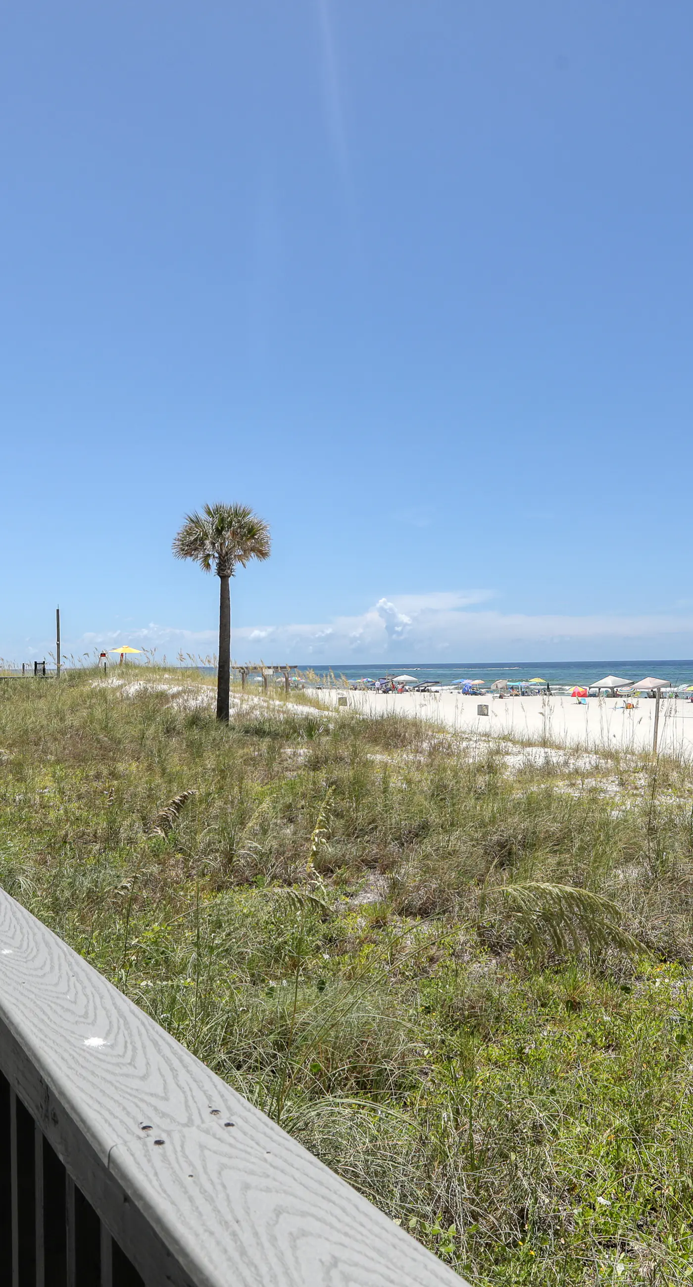Beachfront condo with a private balcony, three pools, tennis, & picnic area