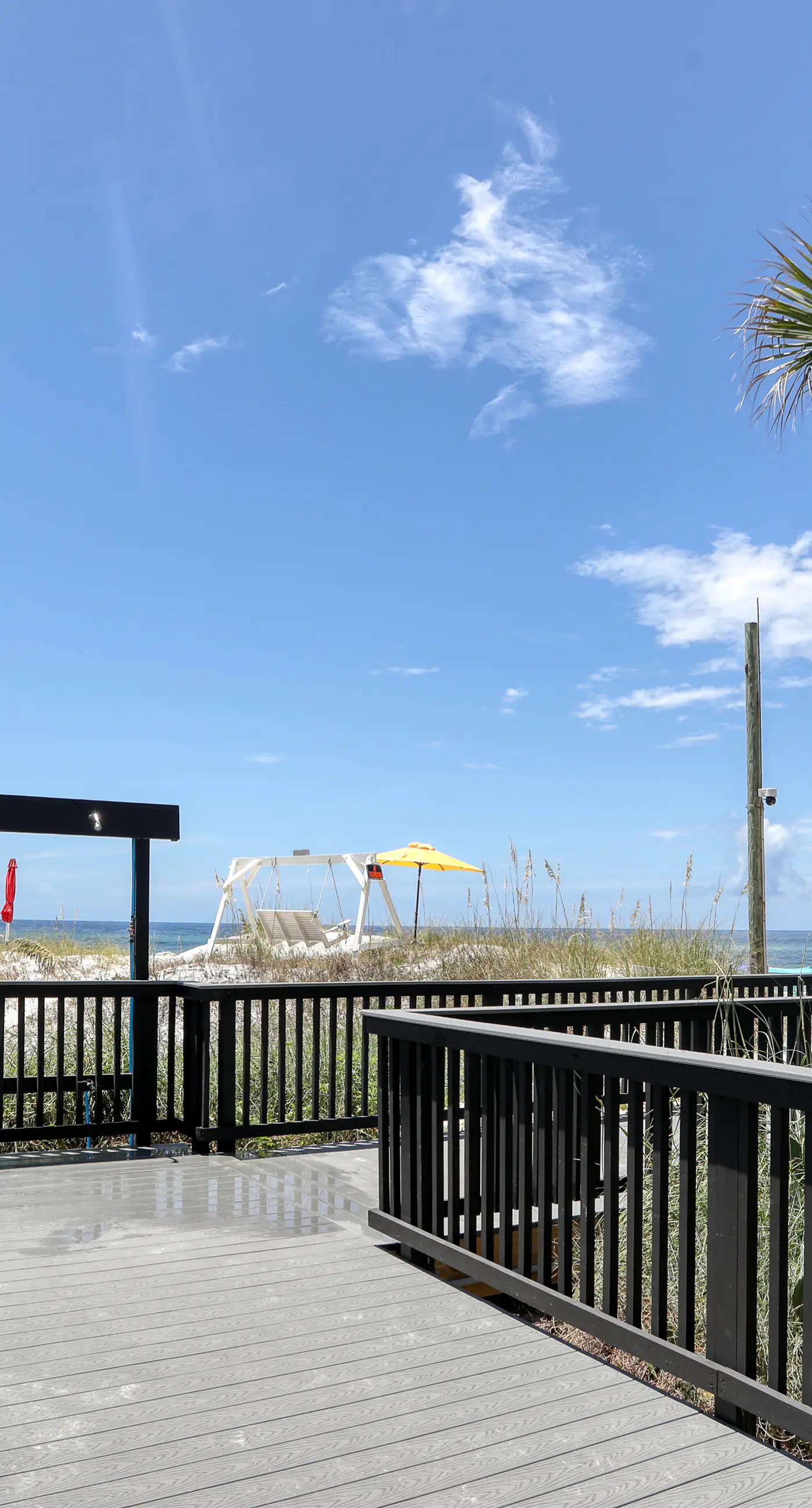 Beachfront condo with a private balcony, three pools, tennis, & picnic area