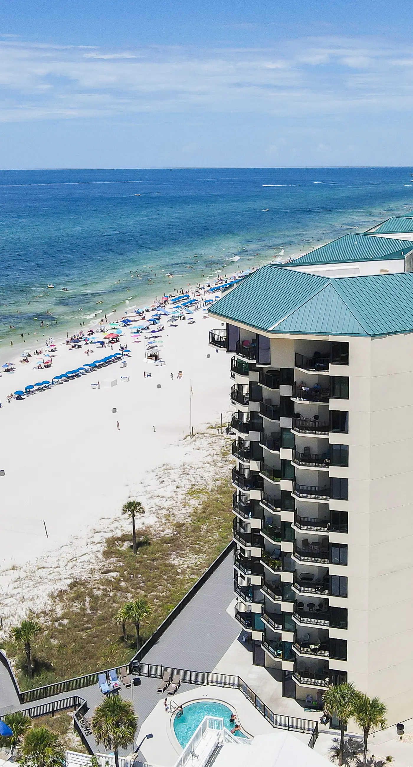 Beachfront condo with a private balcony, three pools, tennis, & picnic area