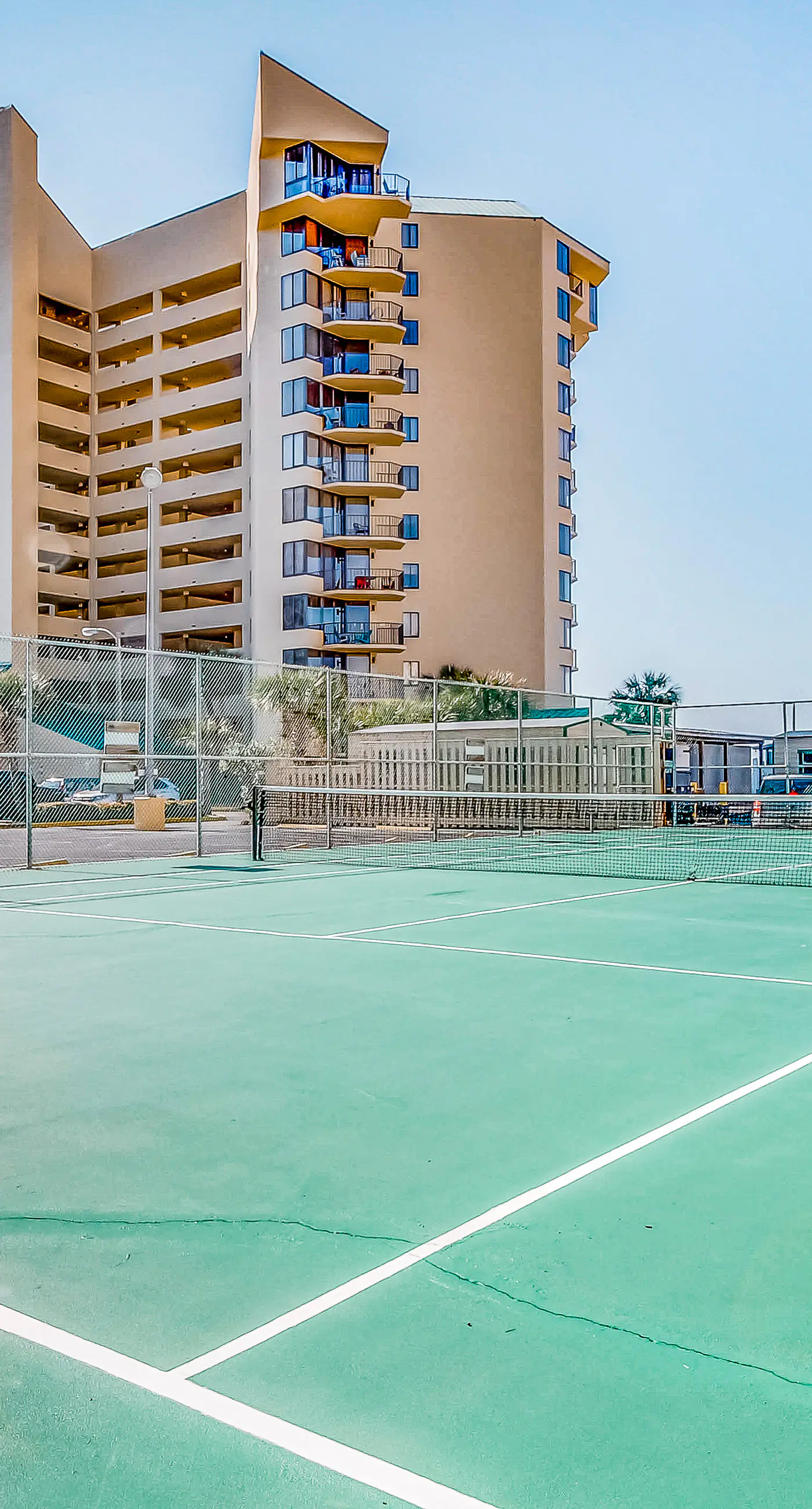 Beautiful beachfront getaway with balcony, pools, tennis, and WiFi