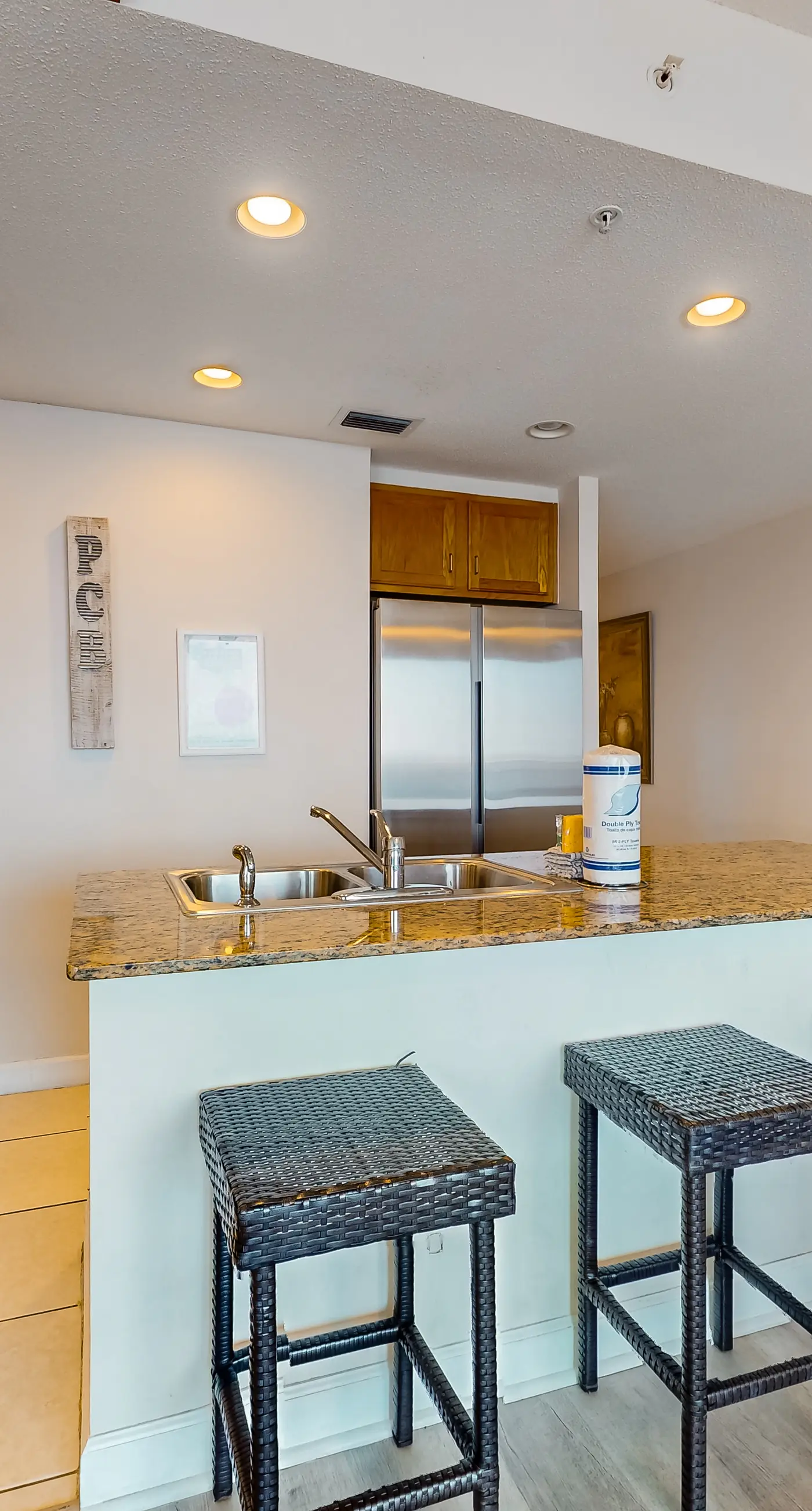 Waterfront condo with grills, pool & fitness center - walk to the beach