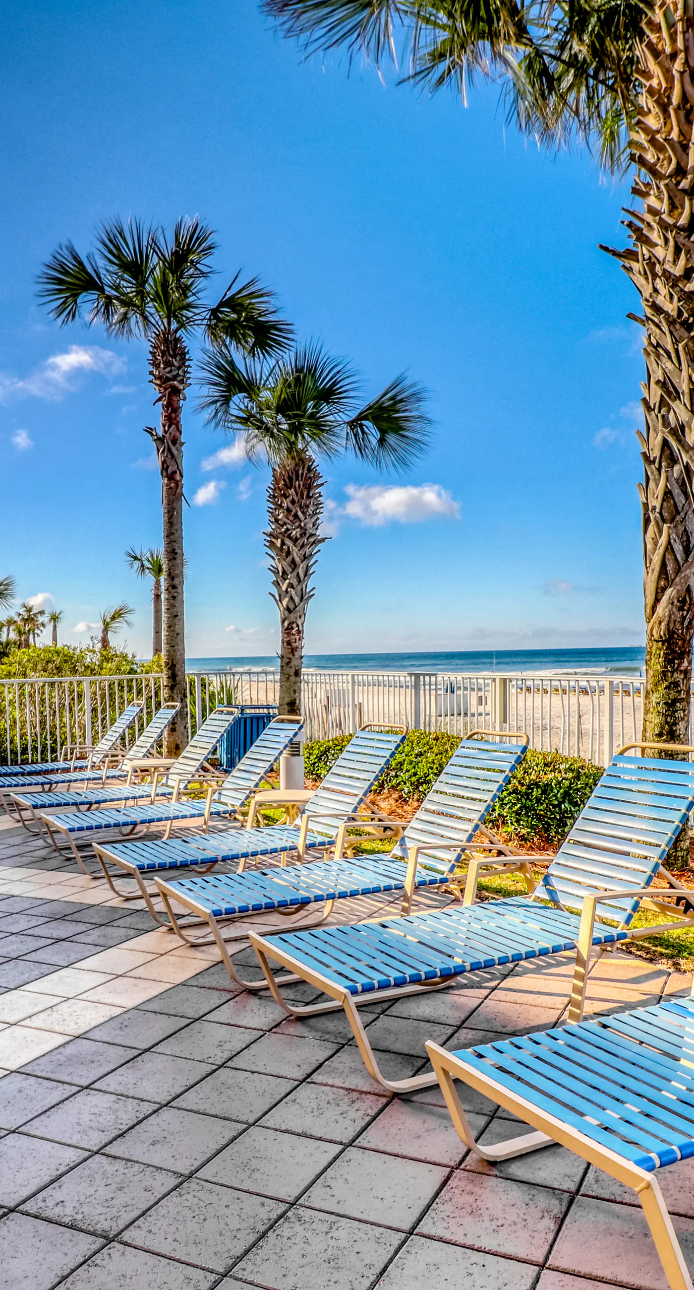 Waterfront condo with grills, pool & fitness center - walk to the beach