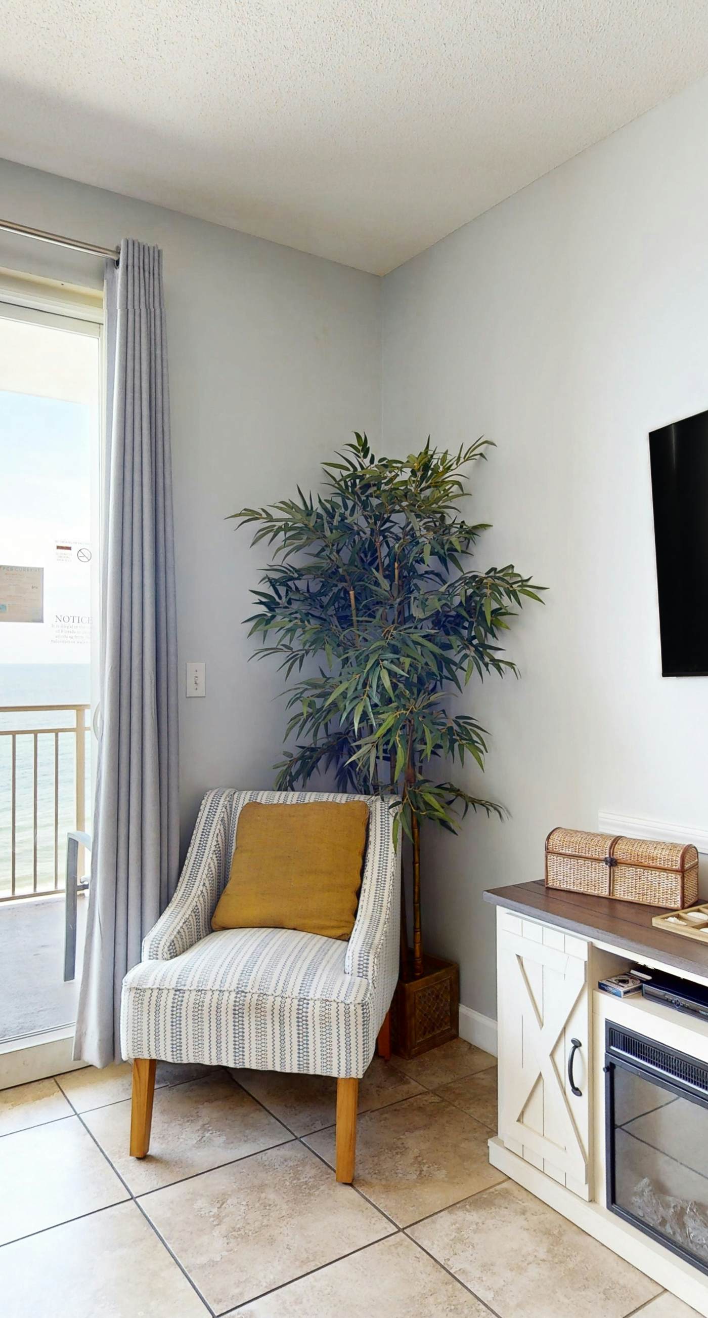 Tropical-themed condo with bi-level pool, fitness center & beach access