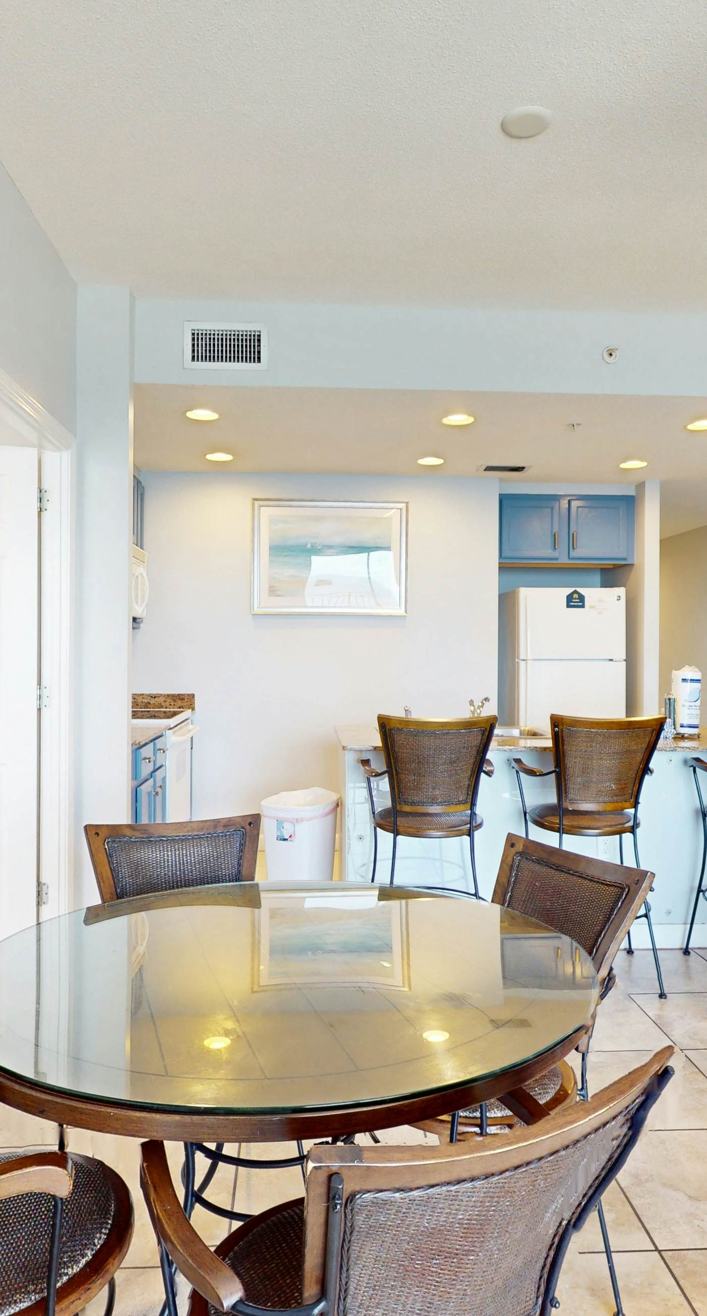 Tropical-themed condo with bi-level pool, fitness center & beach access