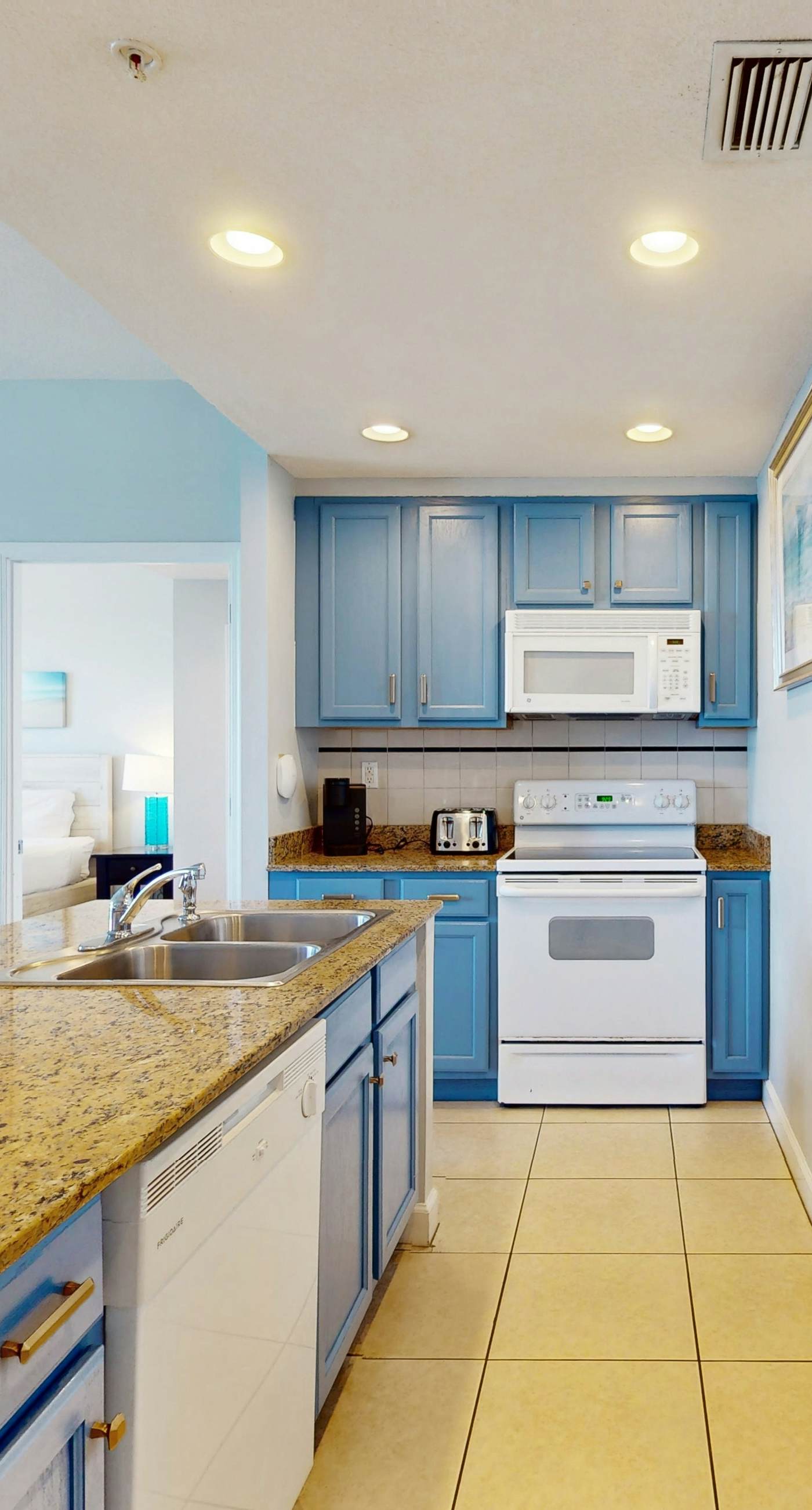 Tropical-themed condo with bi-level pool, fitness center & beach access