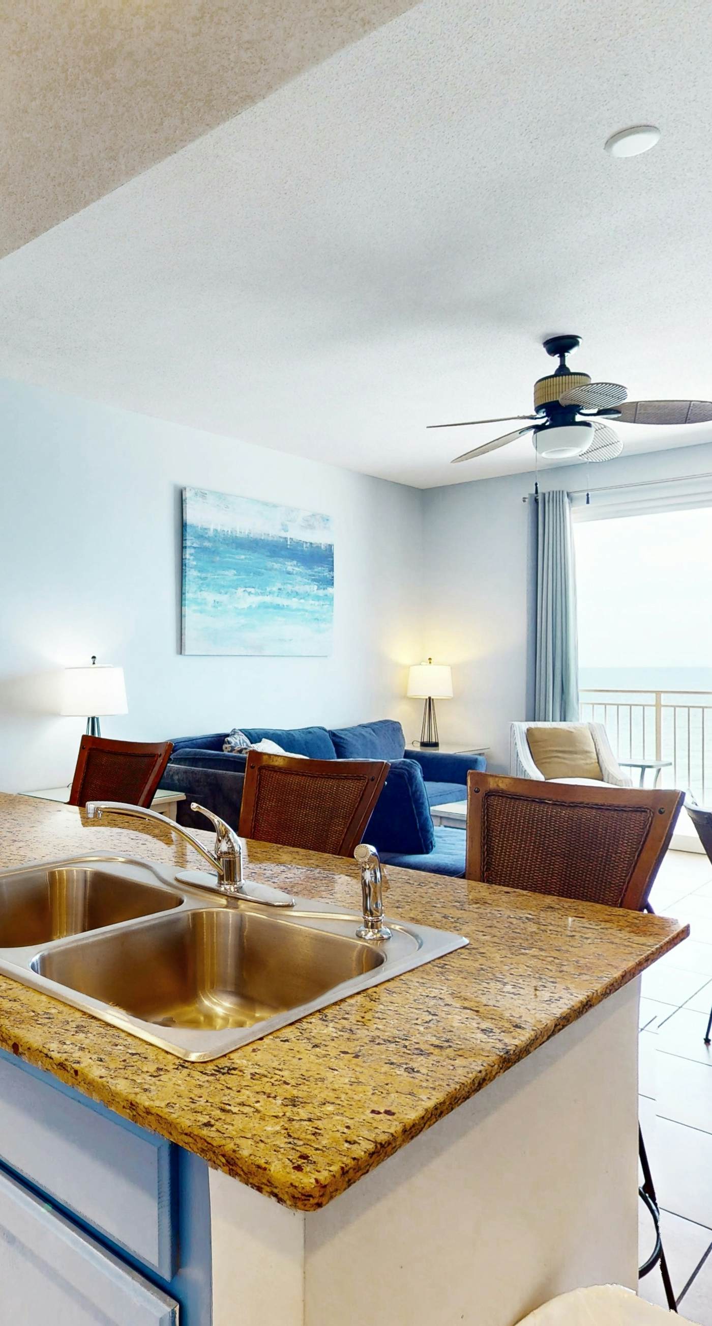 Tropical-themed condo with bi-level pool, fitness center & beach access