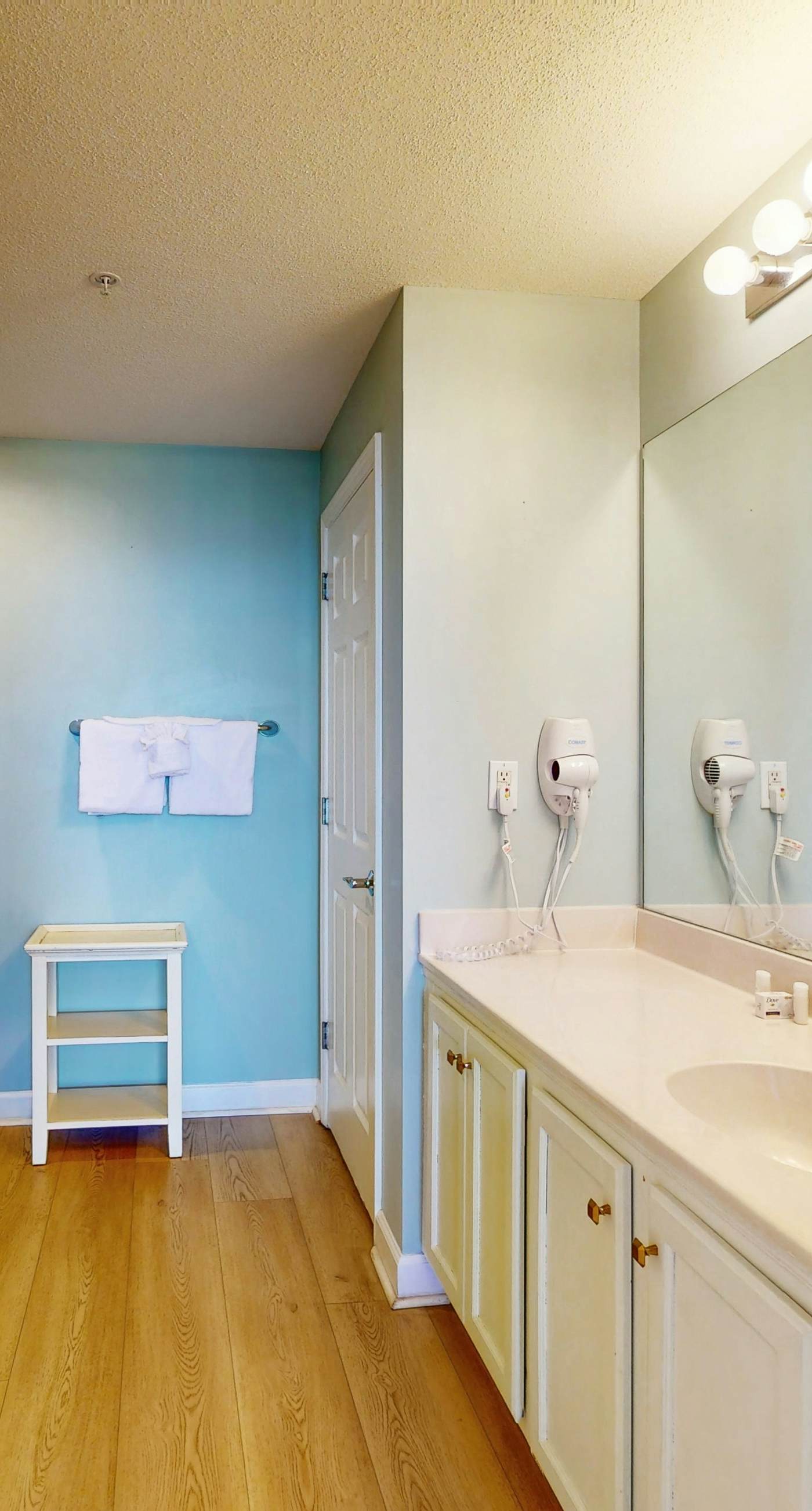 Tropical-themed condo with bi-level pool, fitness center & beach access