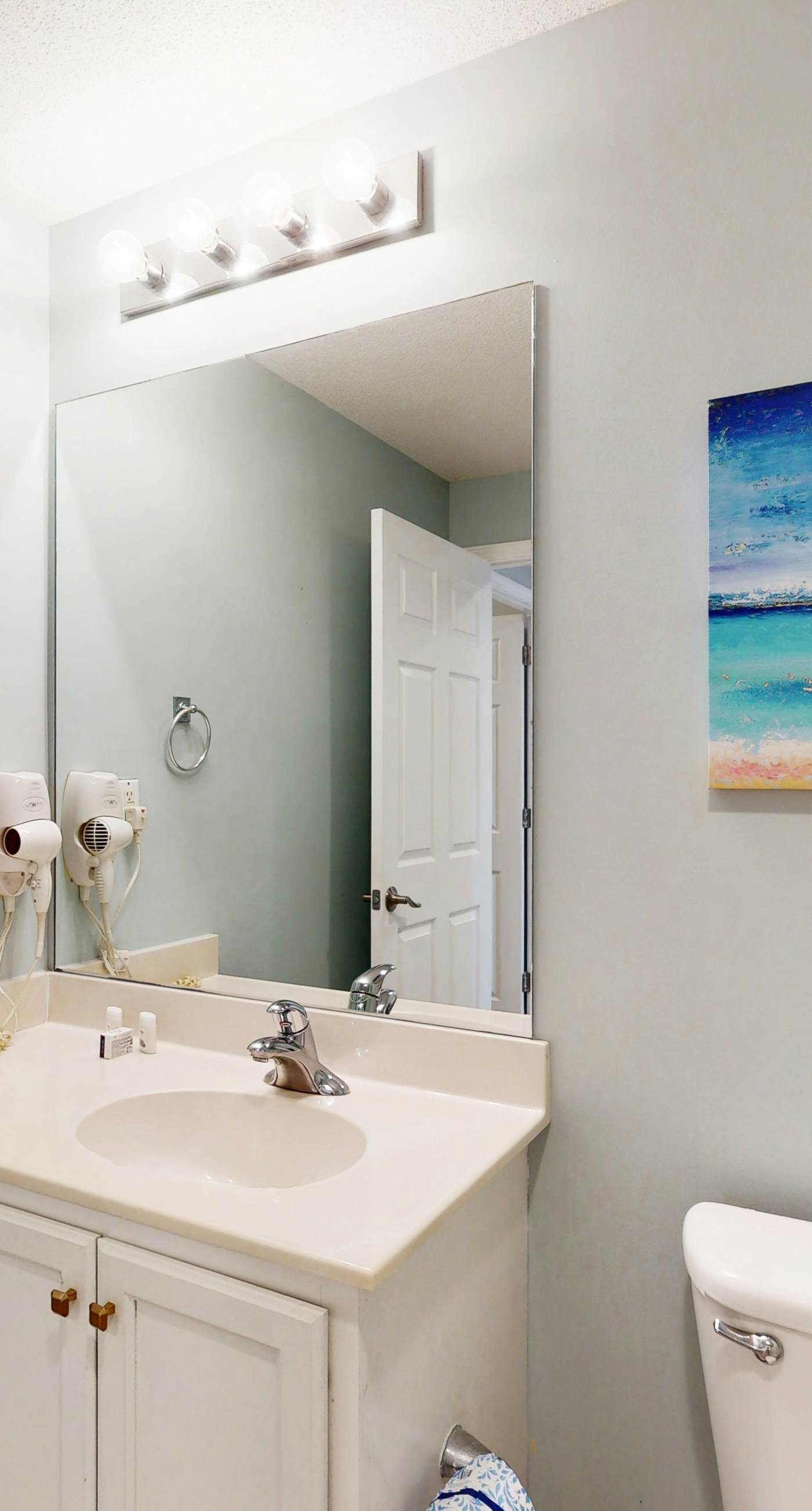 Tropical-themed condo with bi-level pool, fitness center & beach access