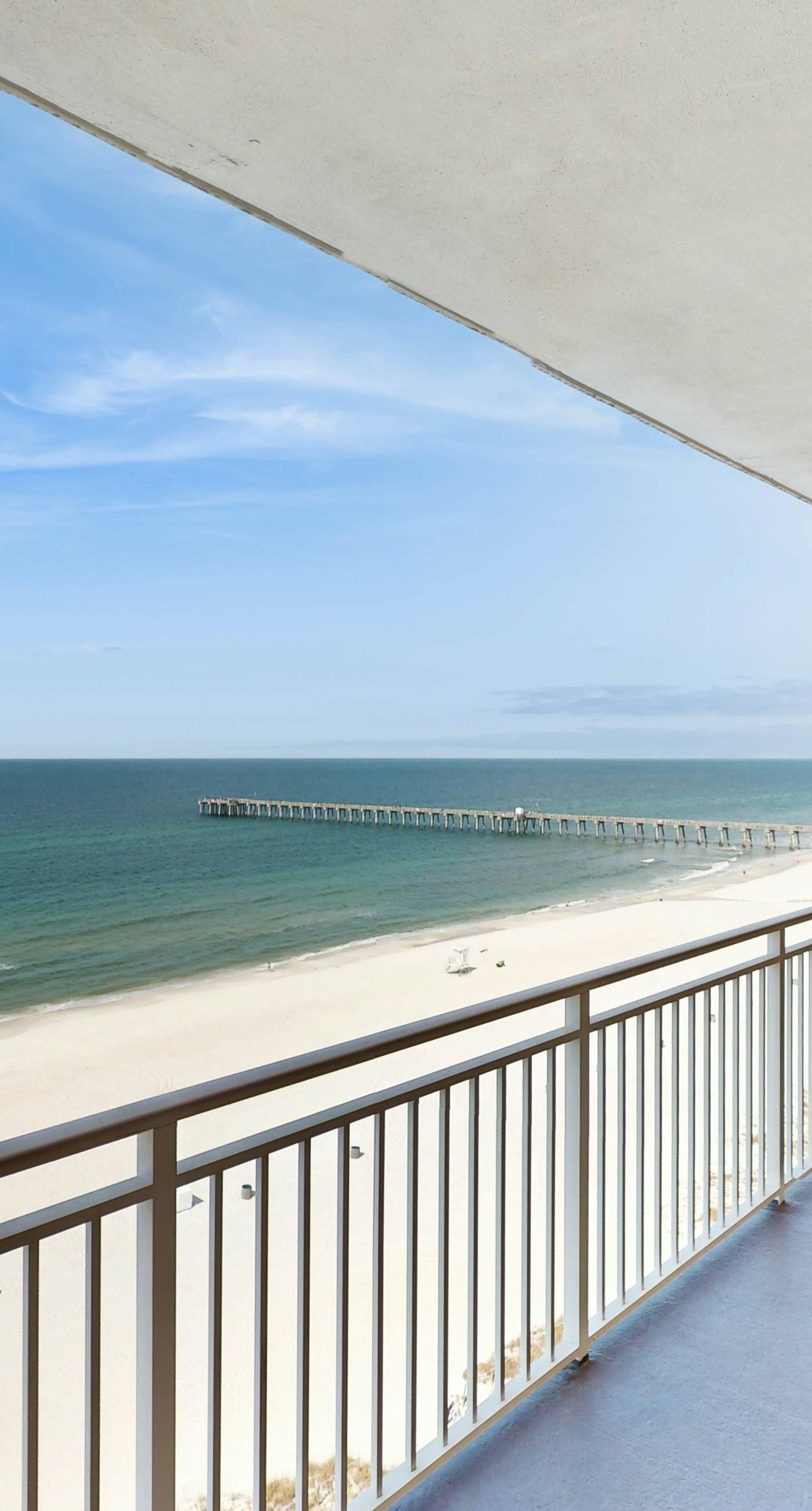 Tropical-themed condo with bi-level pool, fitness center & beach access