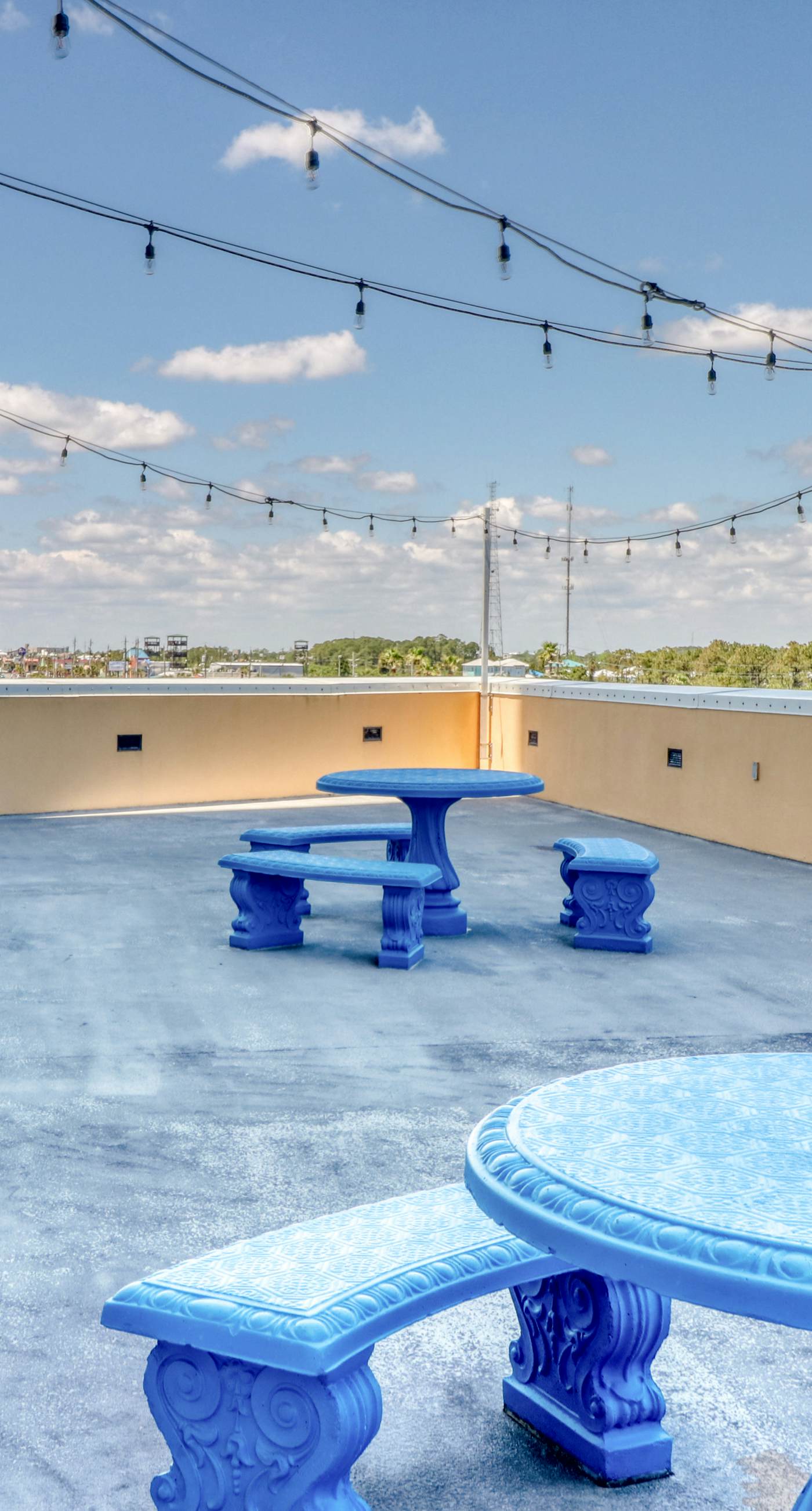 Tropical-themed condo with bi-level pool, fitness center & beach access