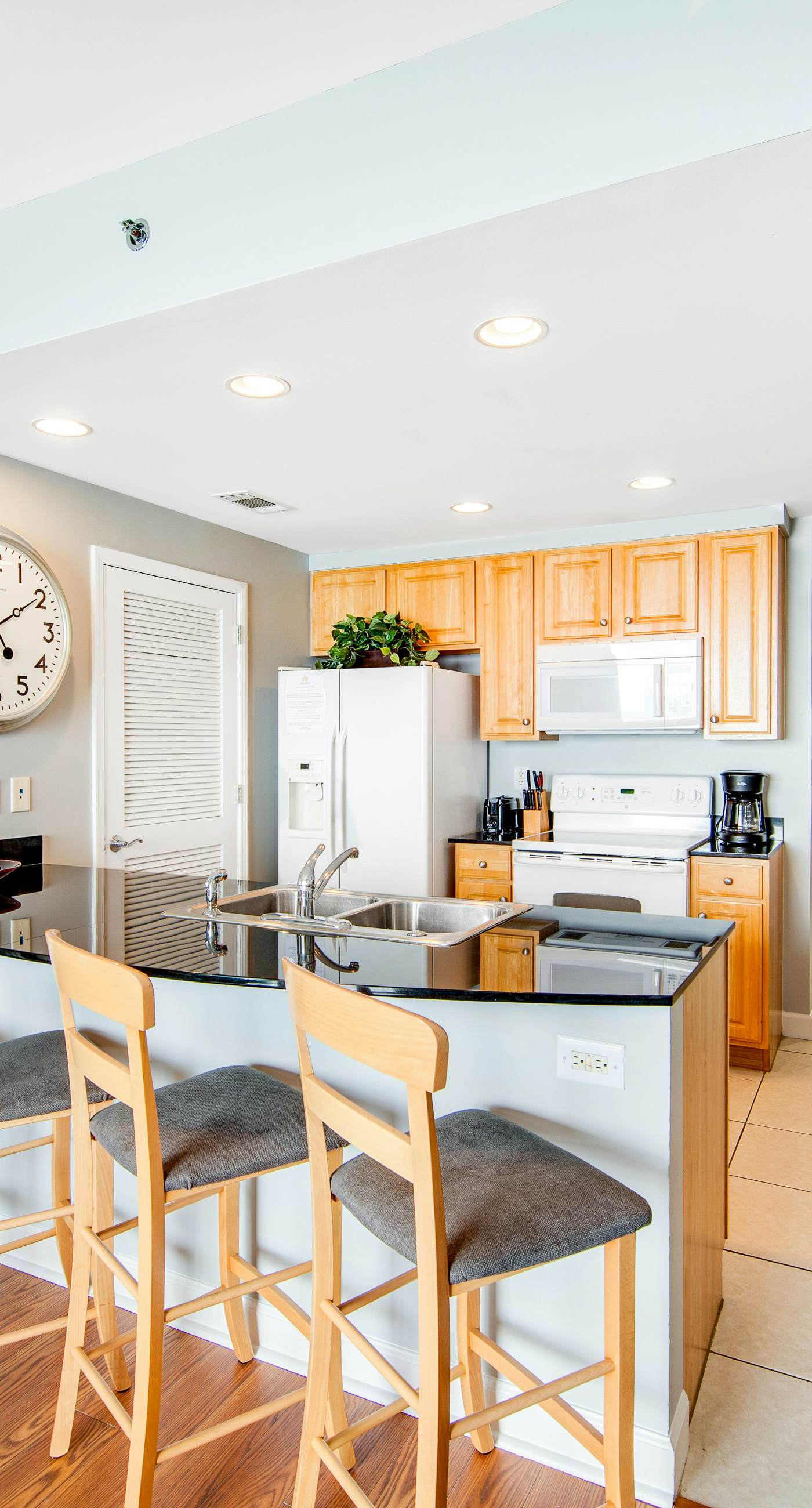 Colorful, beachfront condo with Gulf view, pool, hot tub, and lazy river