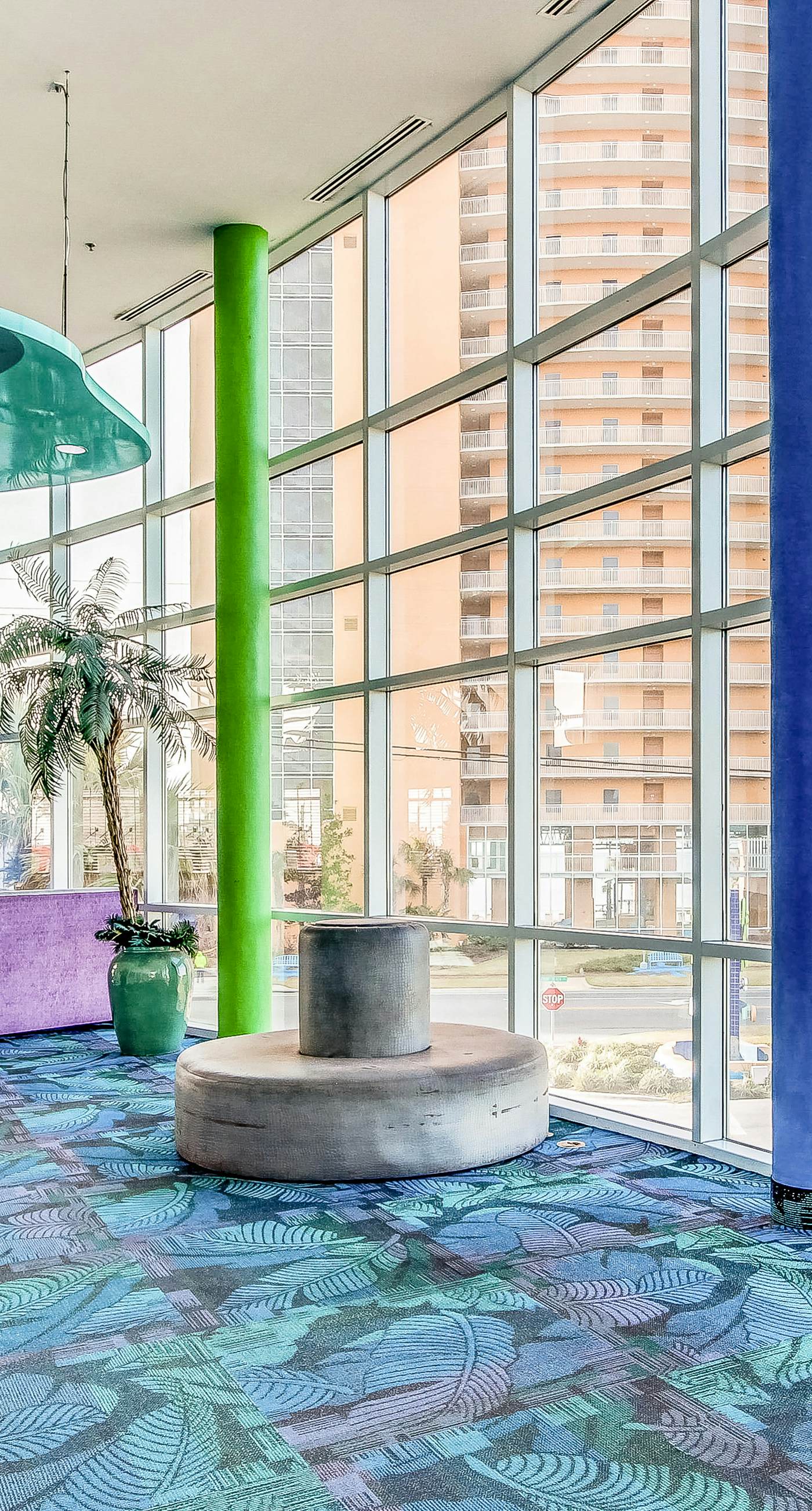 Colorful, beachfront condo with Gulf view, pool, hot tub, and lazy river