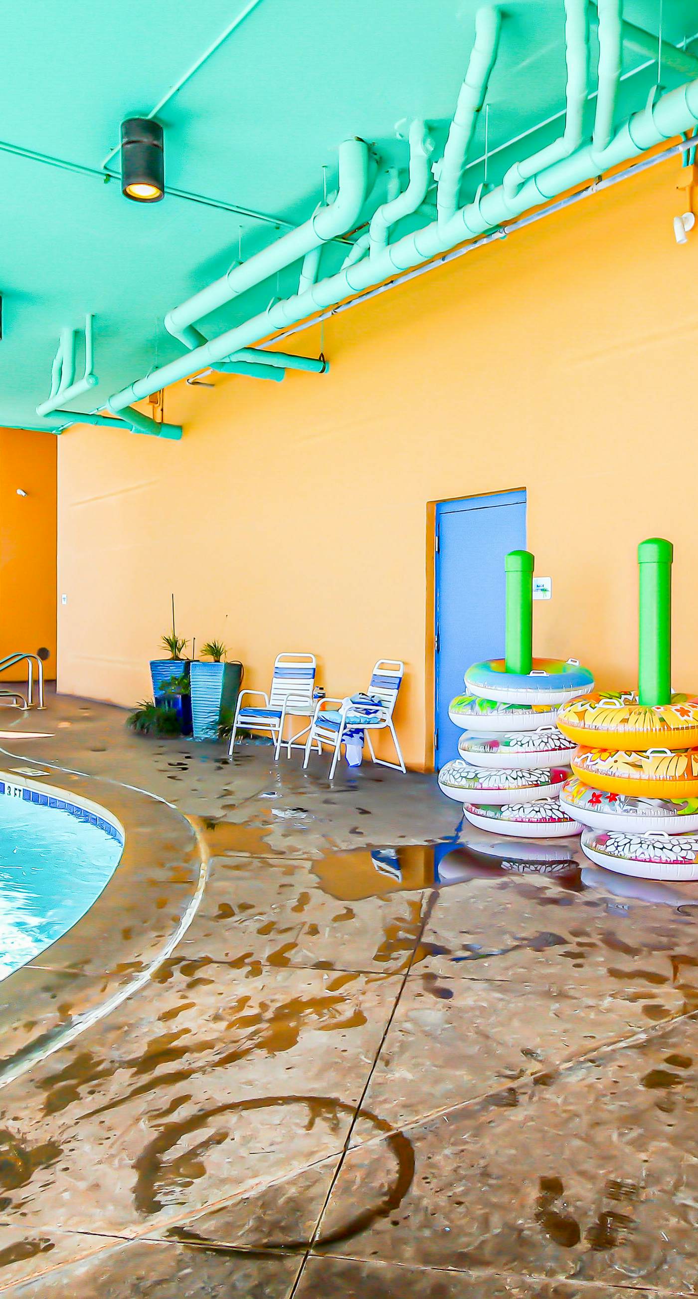 Colorful, beachfront condo with Gulf view, pool, hot tub, and lazy river