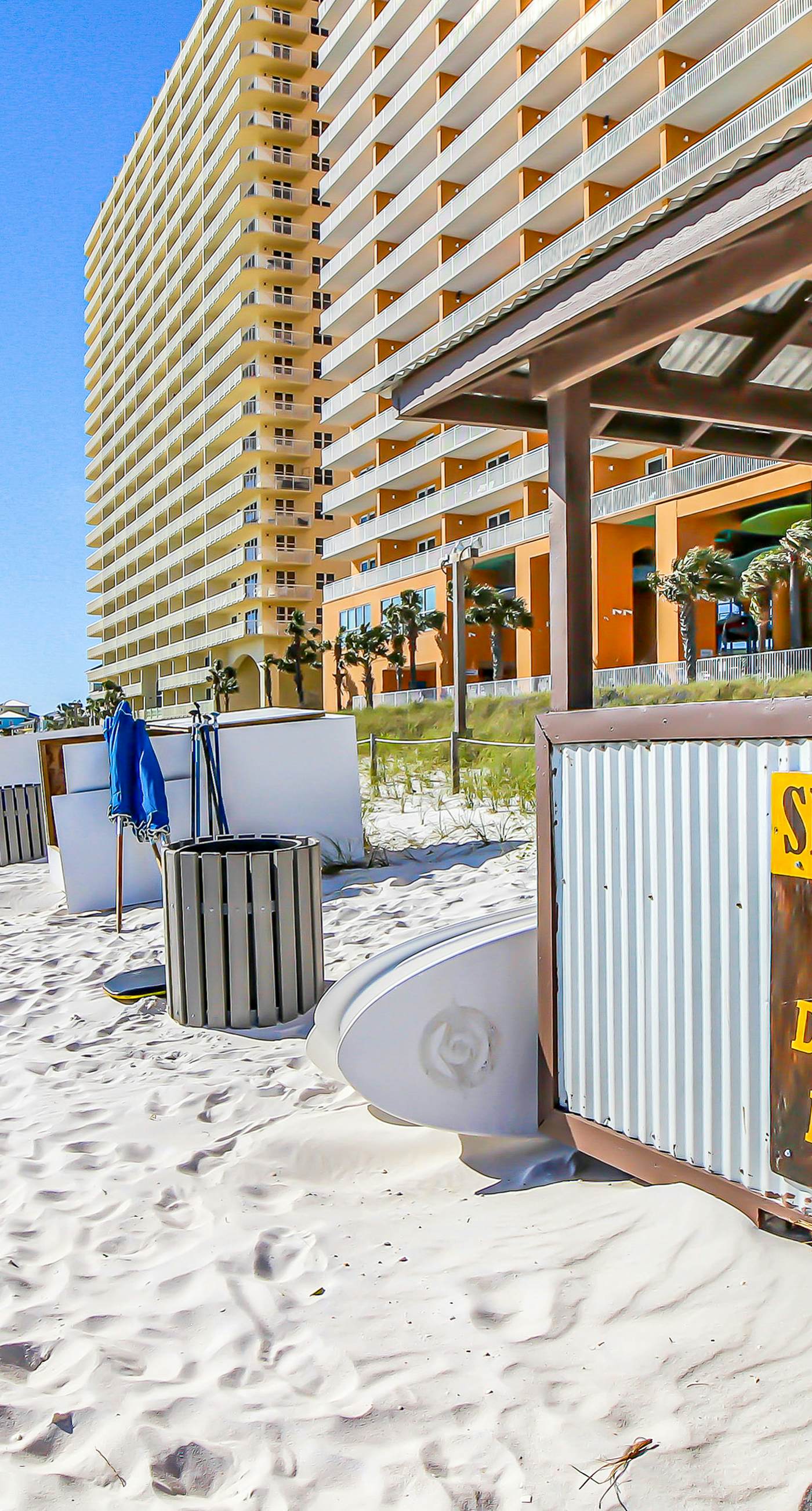 Colorful, beachfront condo with Gulf view, pool, hot tub, and lazy river