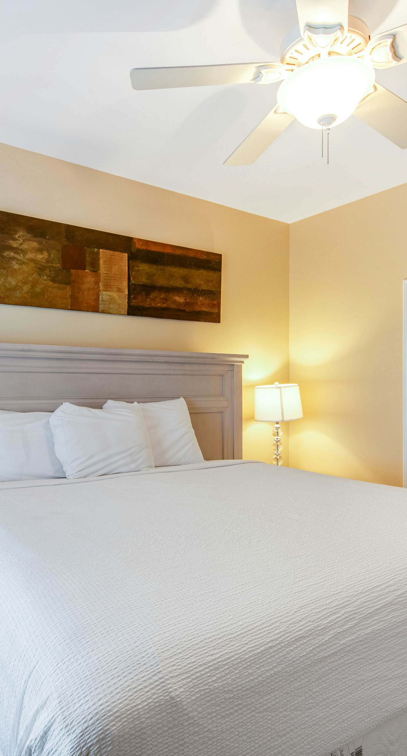 Stylish Gulf-front condo steps from the beach with resort pool, hot tub & gym