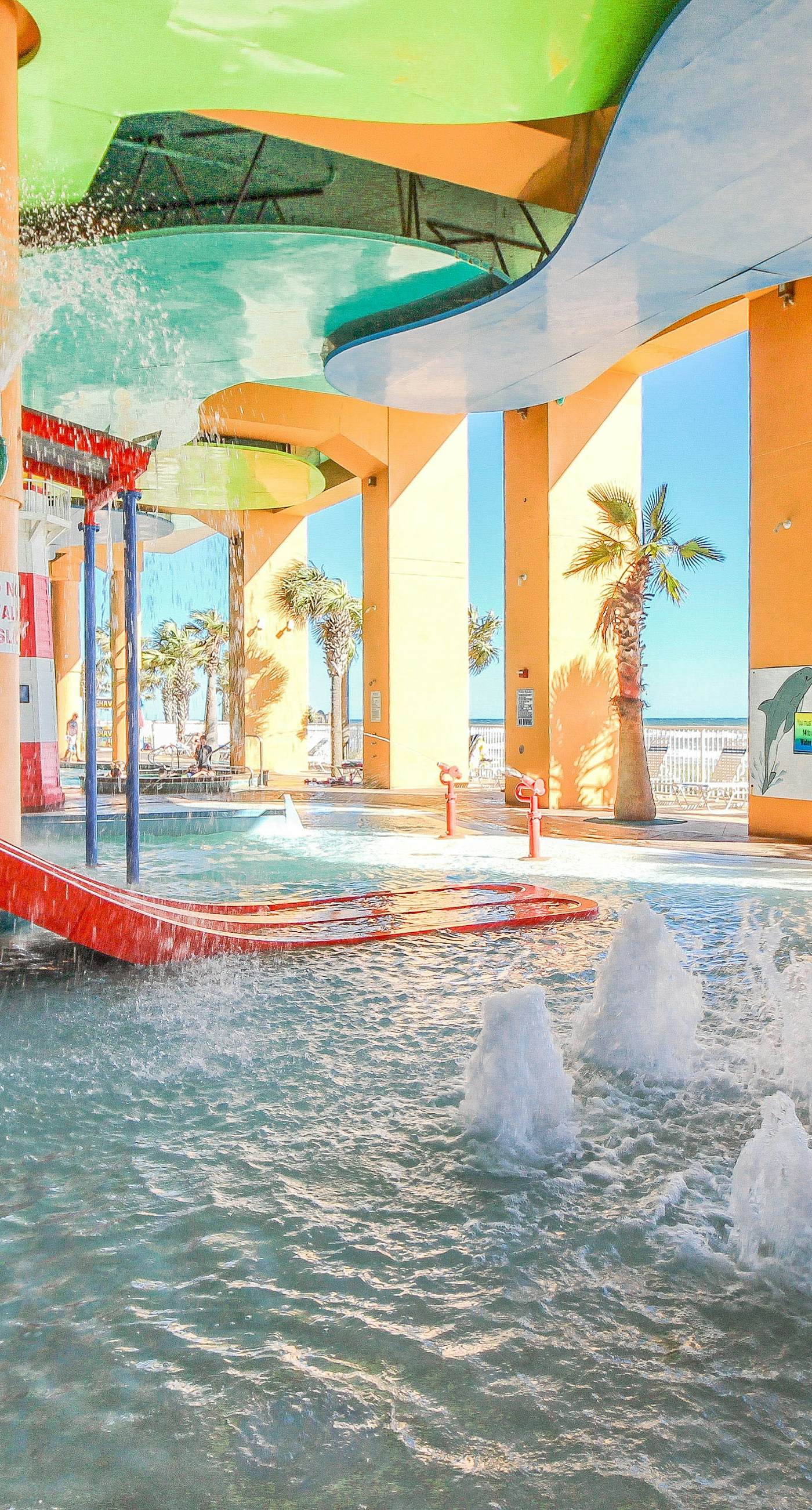 Stylish Gulf-front condo steps from the beach with resort pool, hot tub & gym