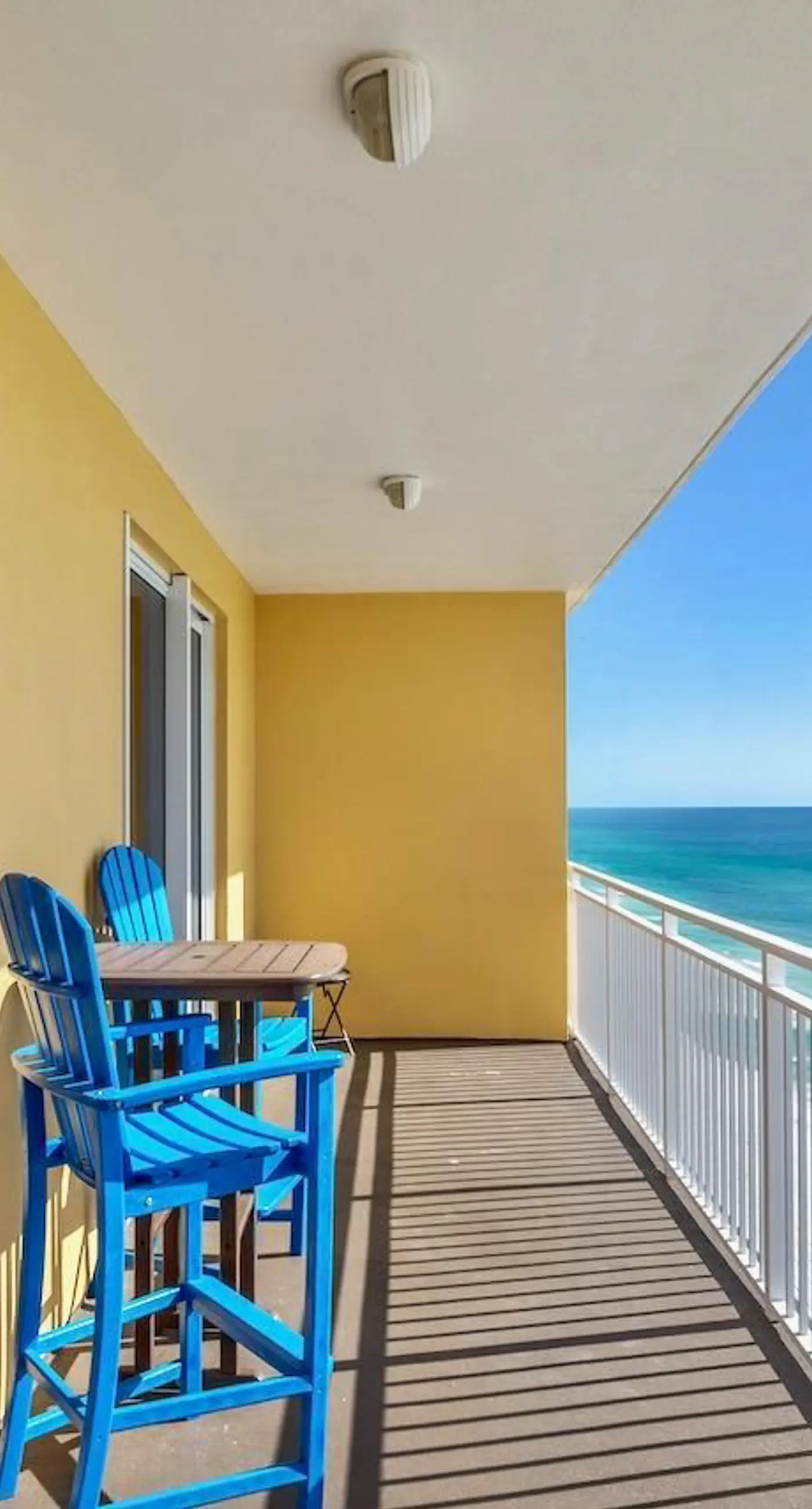 Gulf-front condo with pier views, balcony, heated pool, gym & AC