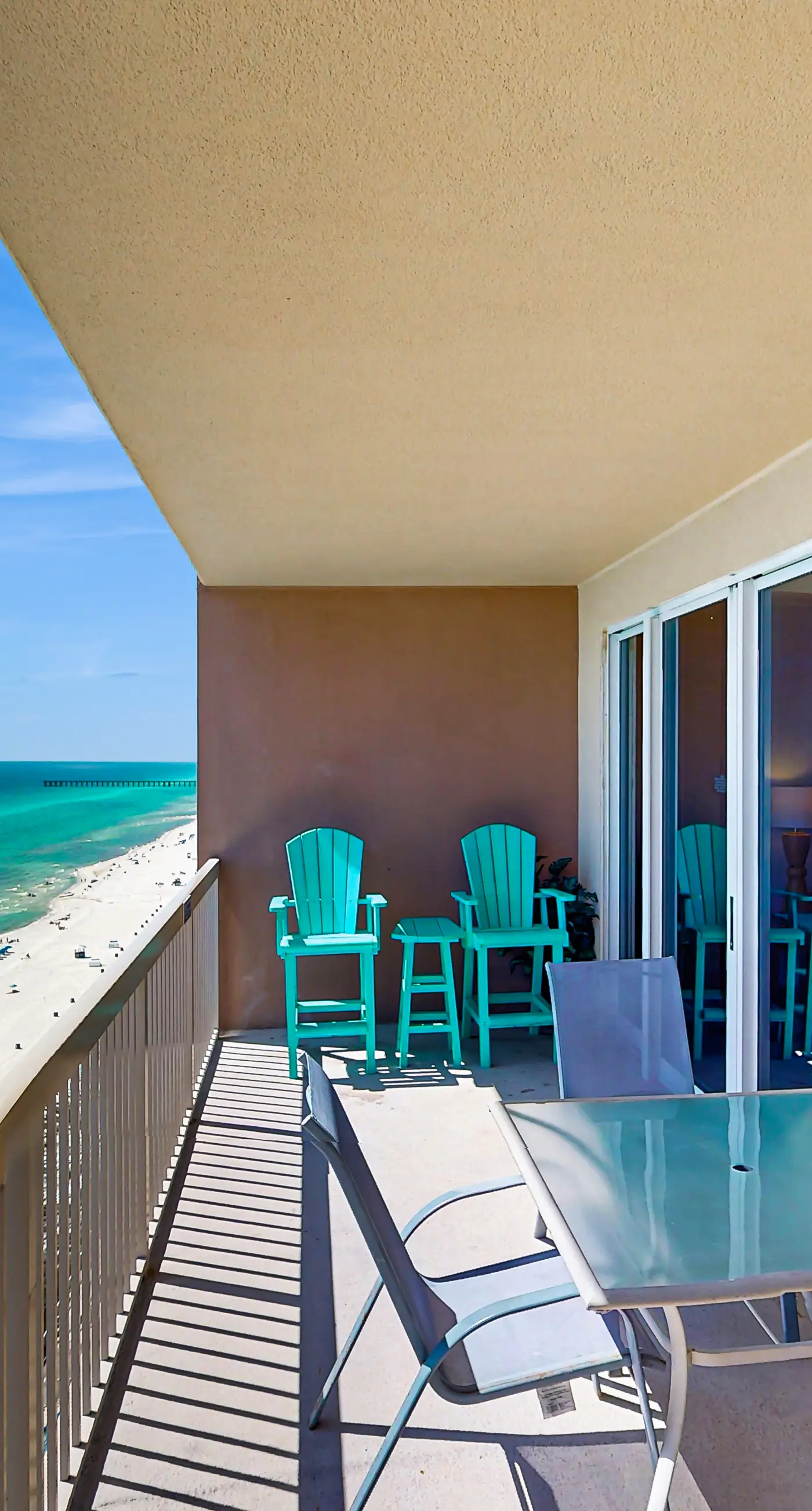 Sand-front condo with pool, hot tub, gym, scenic balcony, smart TVs, W/D, & AC