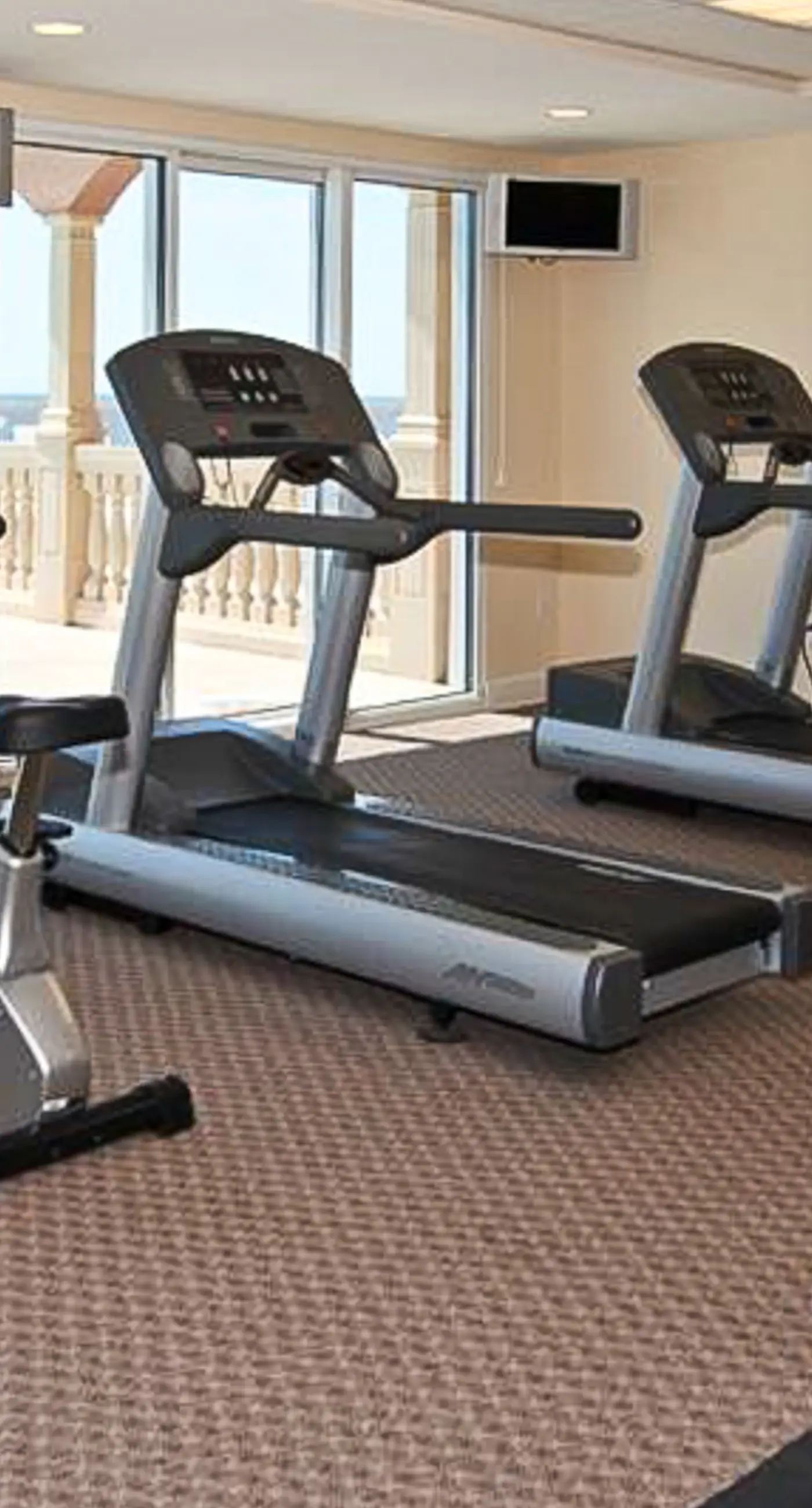 Sand-front condo with pool, hot tub, gym, scenic balcony, smart TVs, W/D, & AC