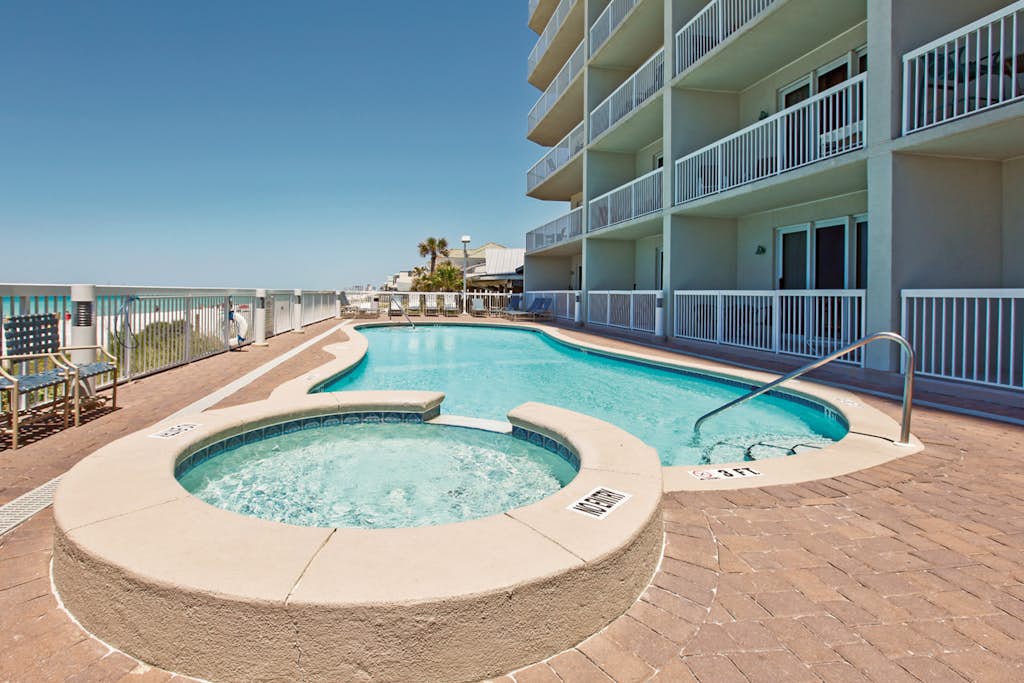 Stunning condo with Gulf view, balcony, hot tub, & pool