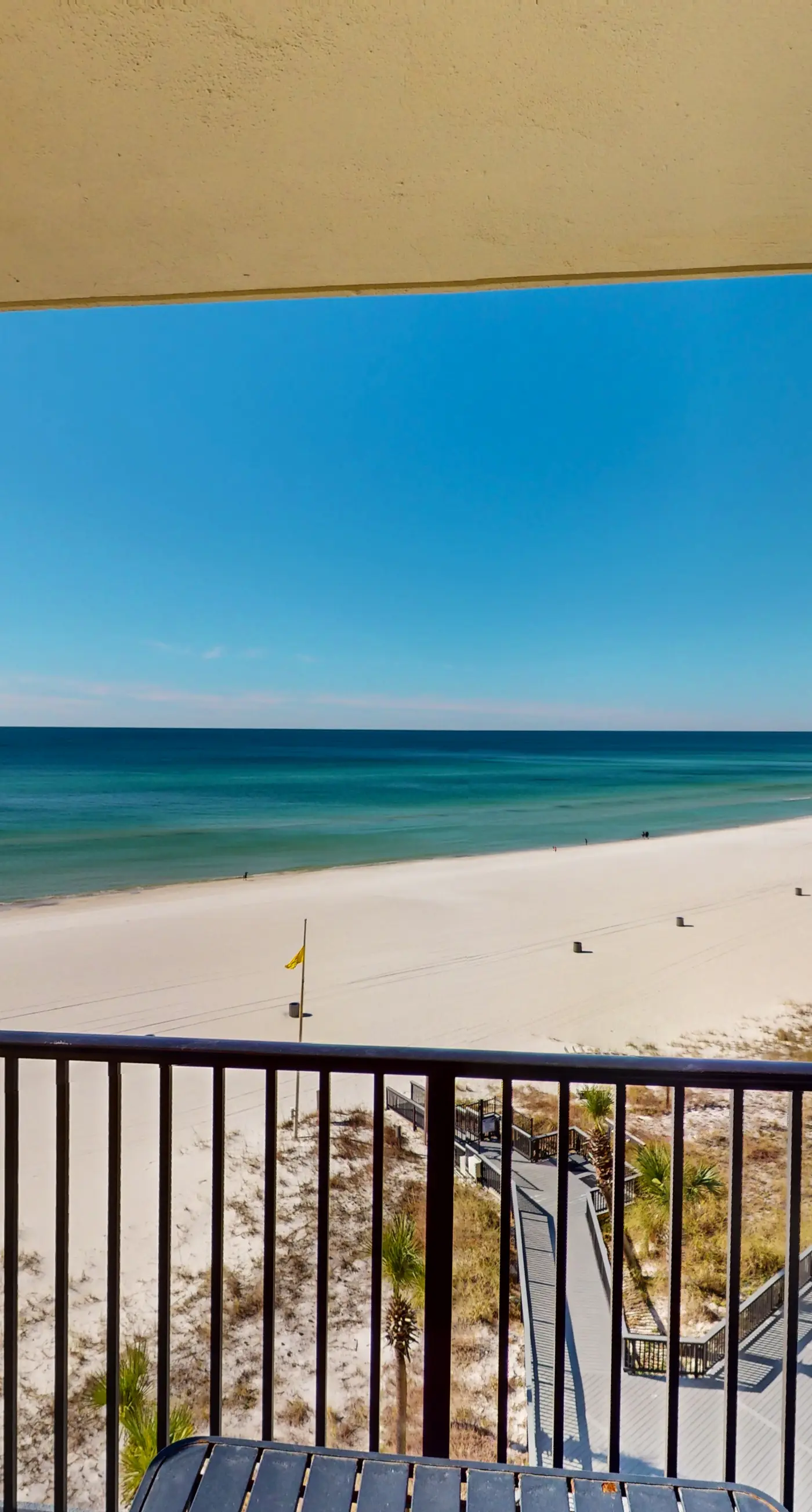Gulf-view condo with furnished balcony, pools, beach access, fitness room