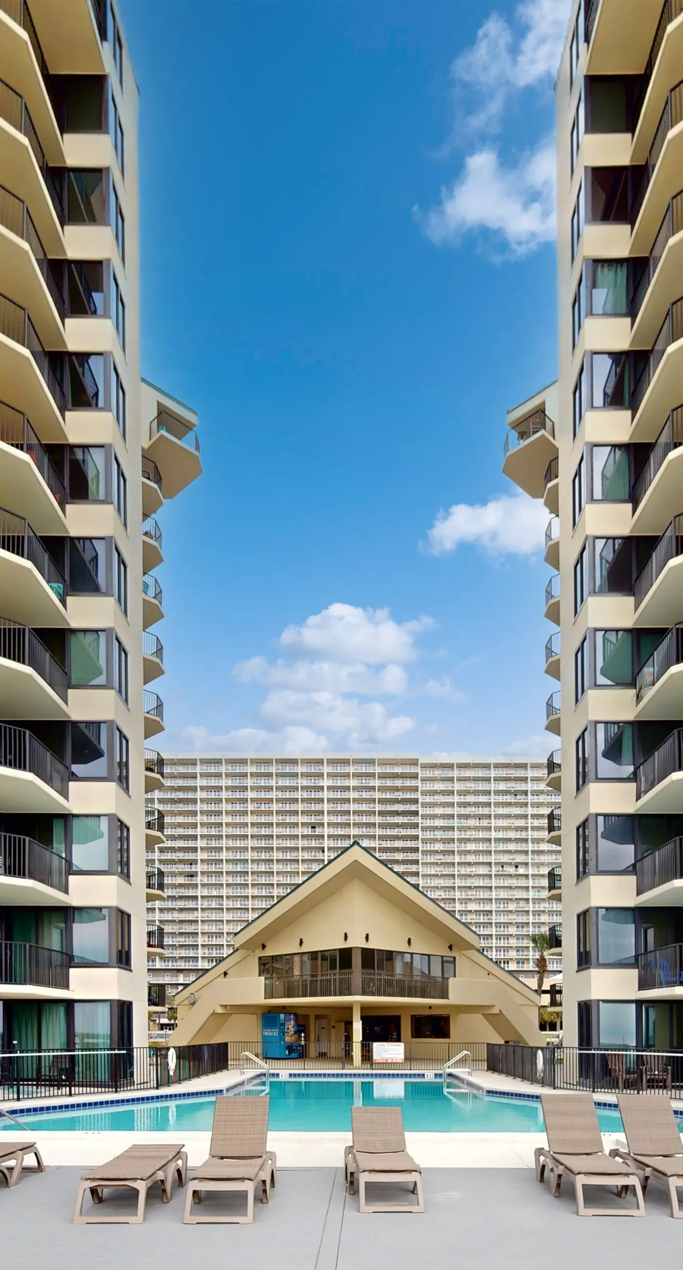 Gulf-view condo with furnished balcony, pools, beach access, fitness room