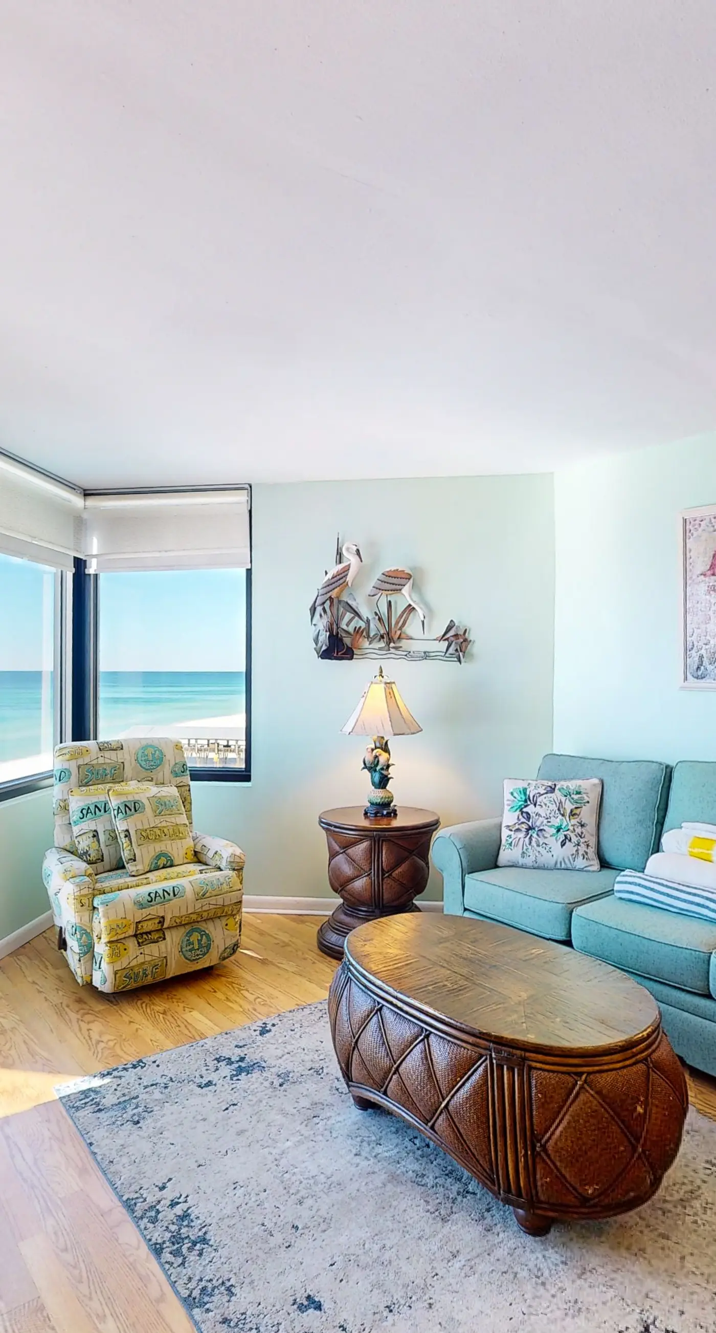 Gulf-view condo with furnished balcony, pools, beach access, fitness room