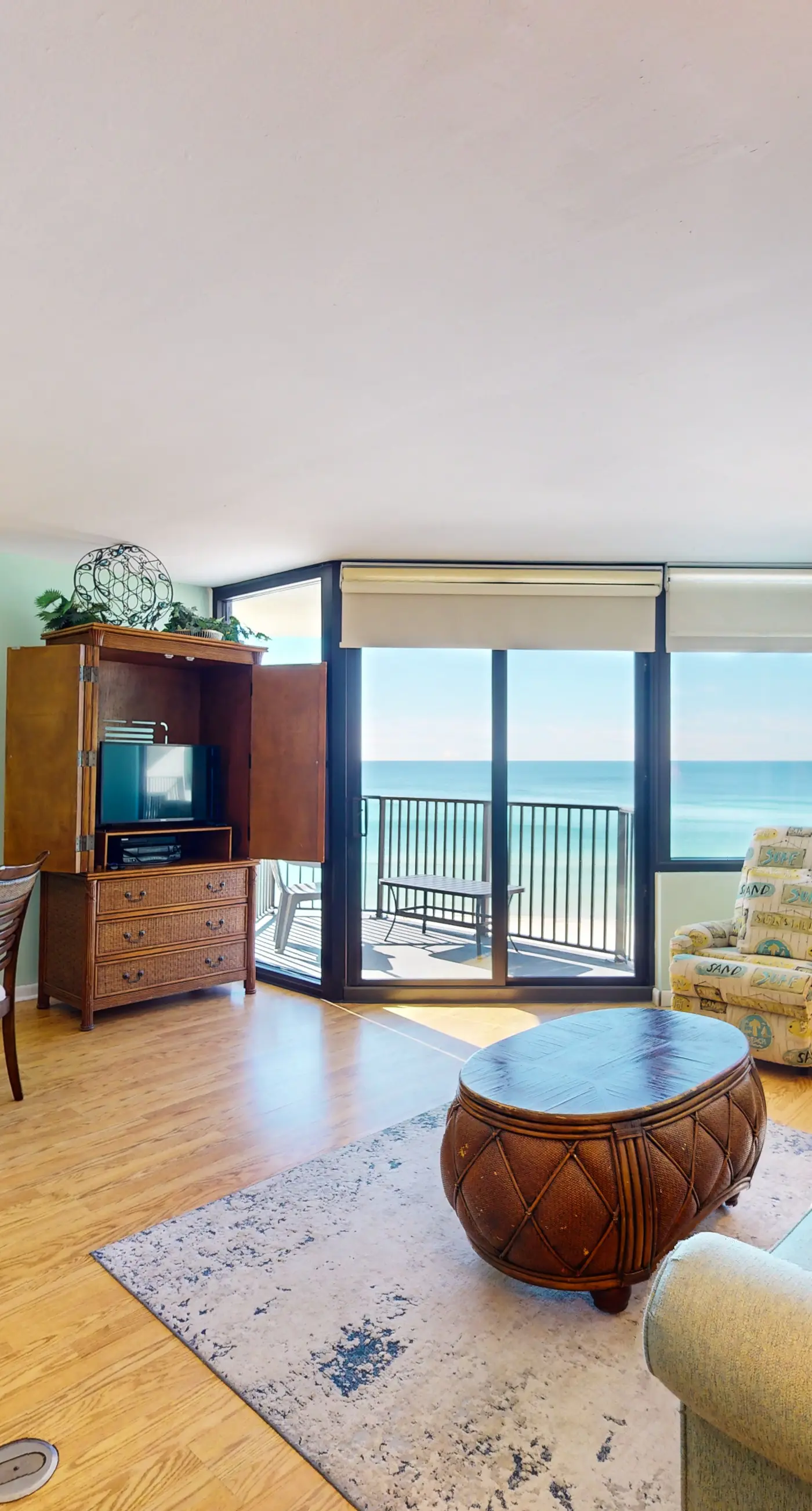 Gulf-view condo with furnished balcony, pools, beach access, fitness room