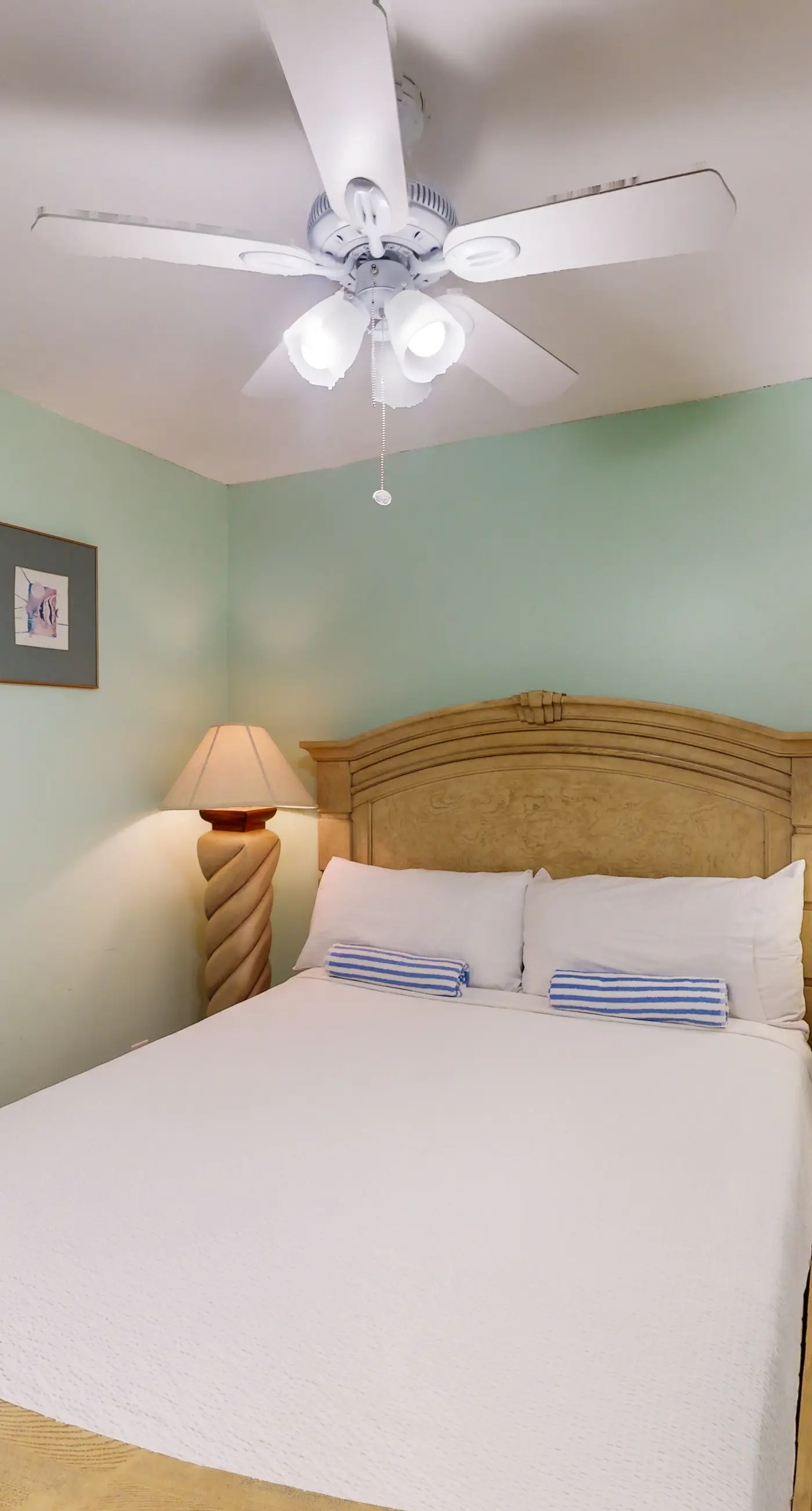 Gulf-view condo with furnished balcony, pools, beach access, fitness room