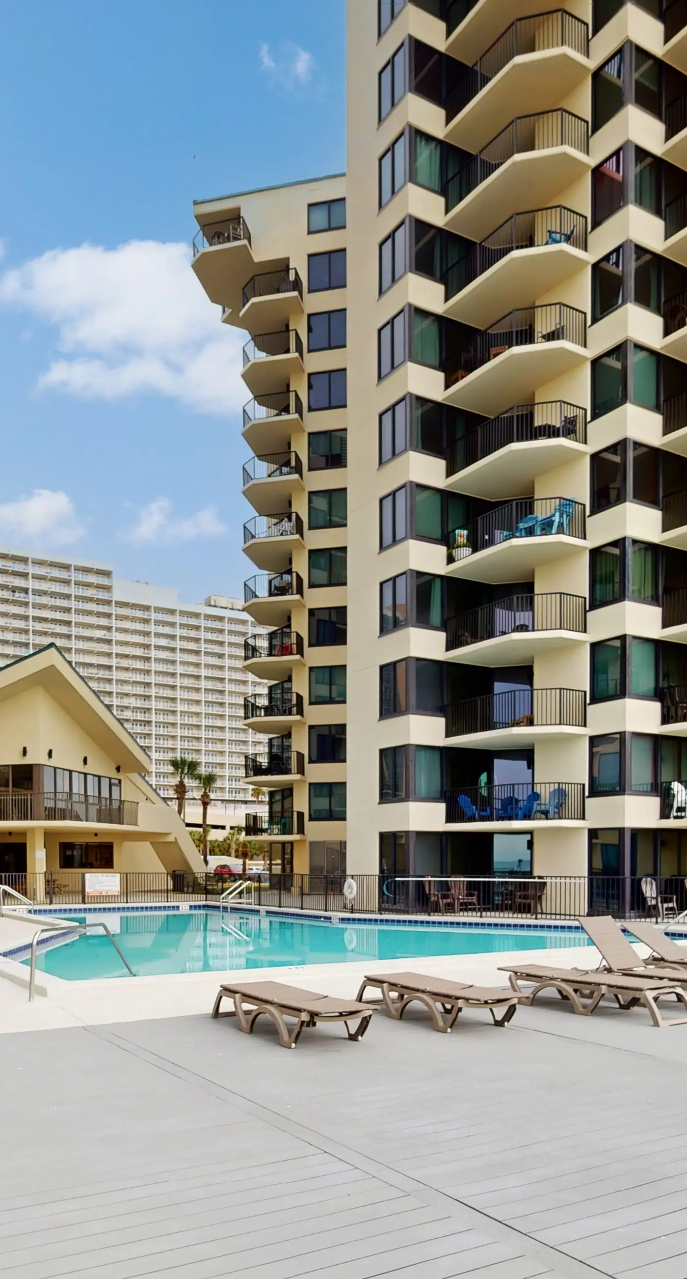 Gulf-view condo with furnished balcony, pools, beach access, fitness room
