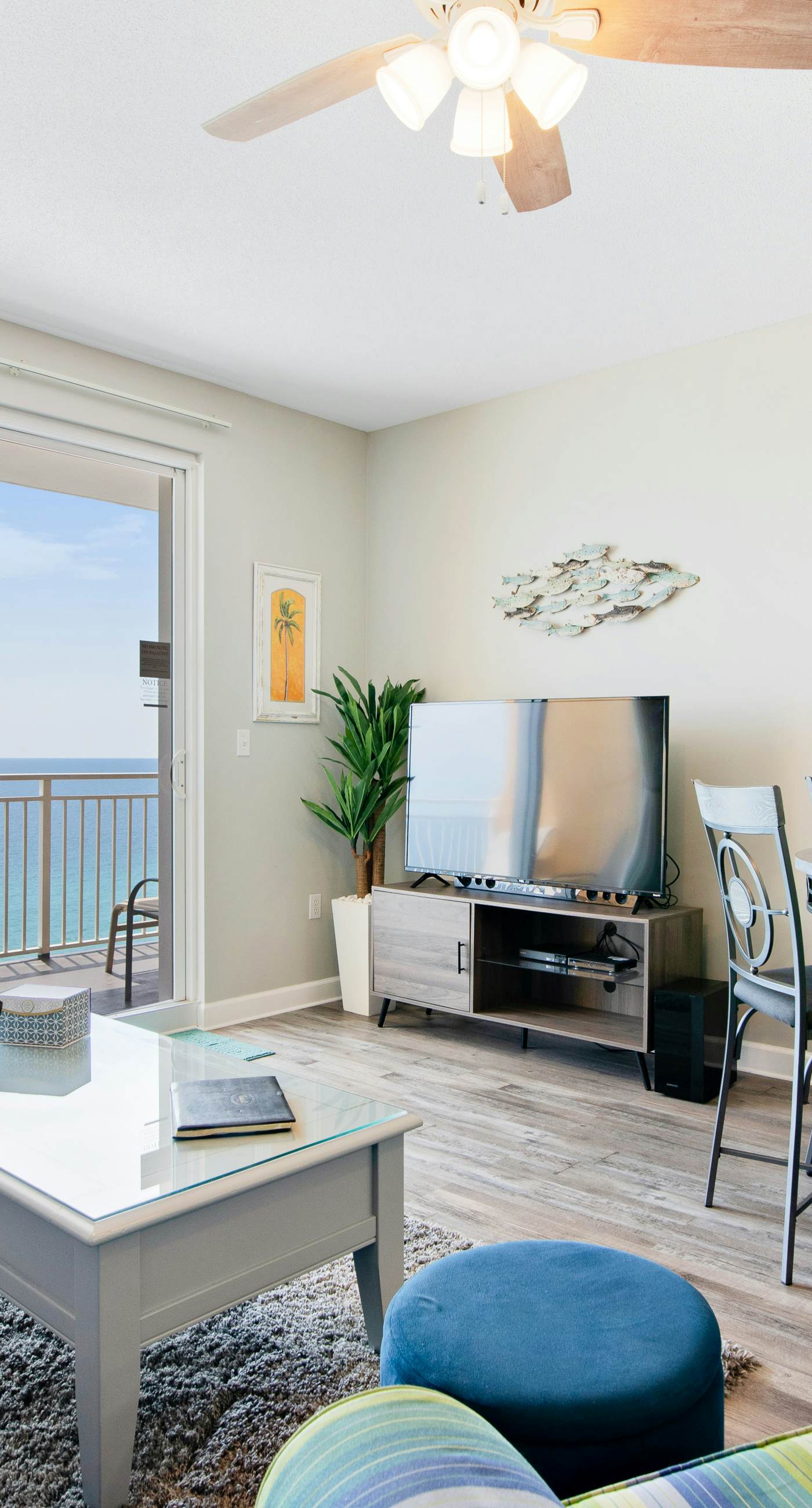 Sunny getaway at the beach with furnished balcony, pool & fitness room