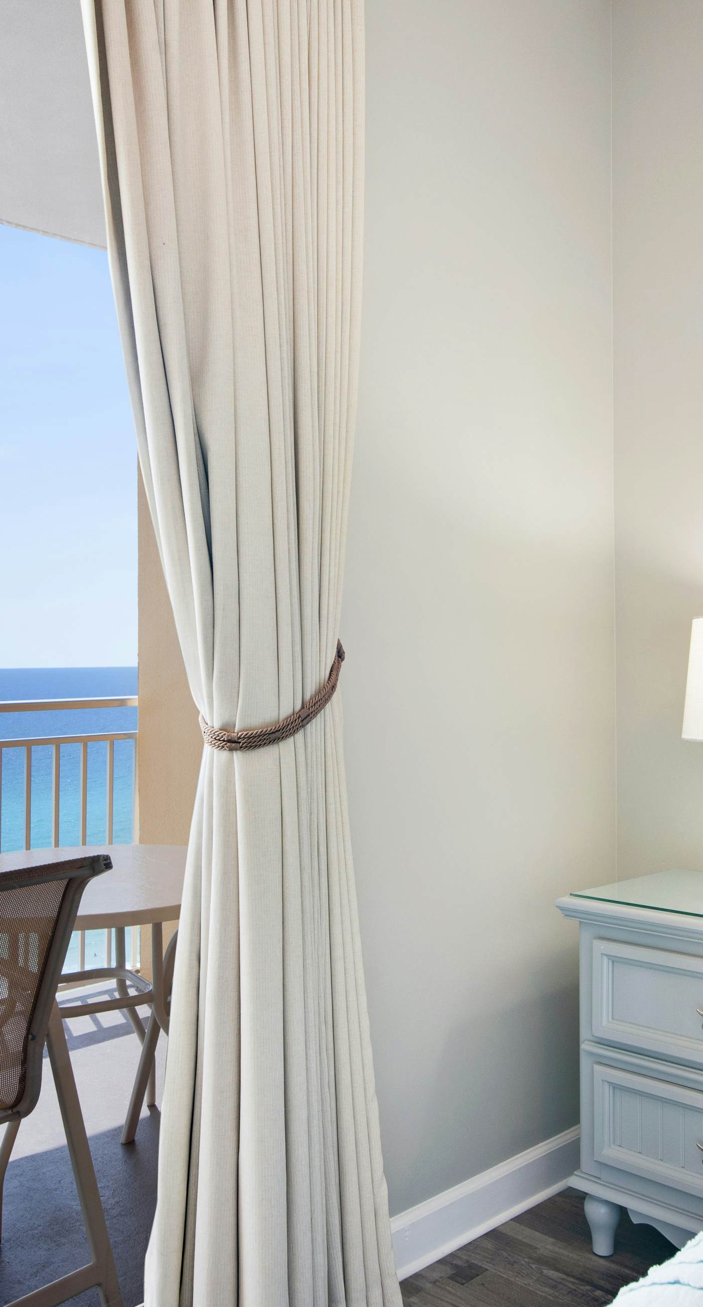 Sunny getaway at the beach with furnished balcony, pool & fitness room