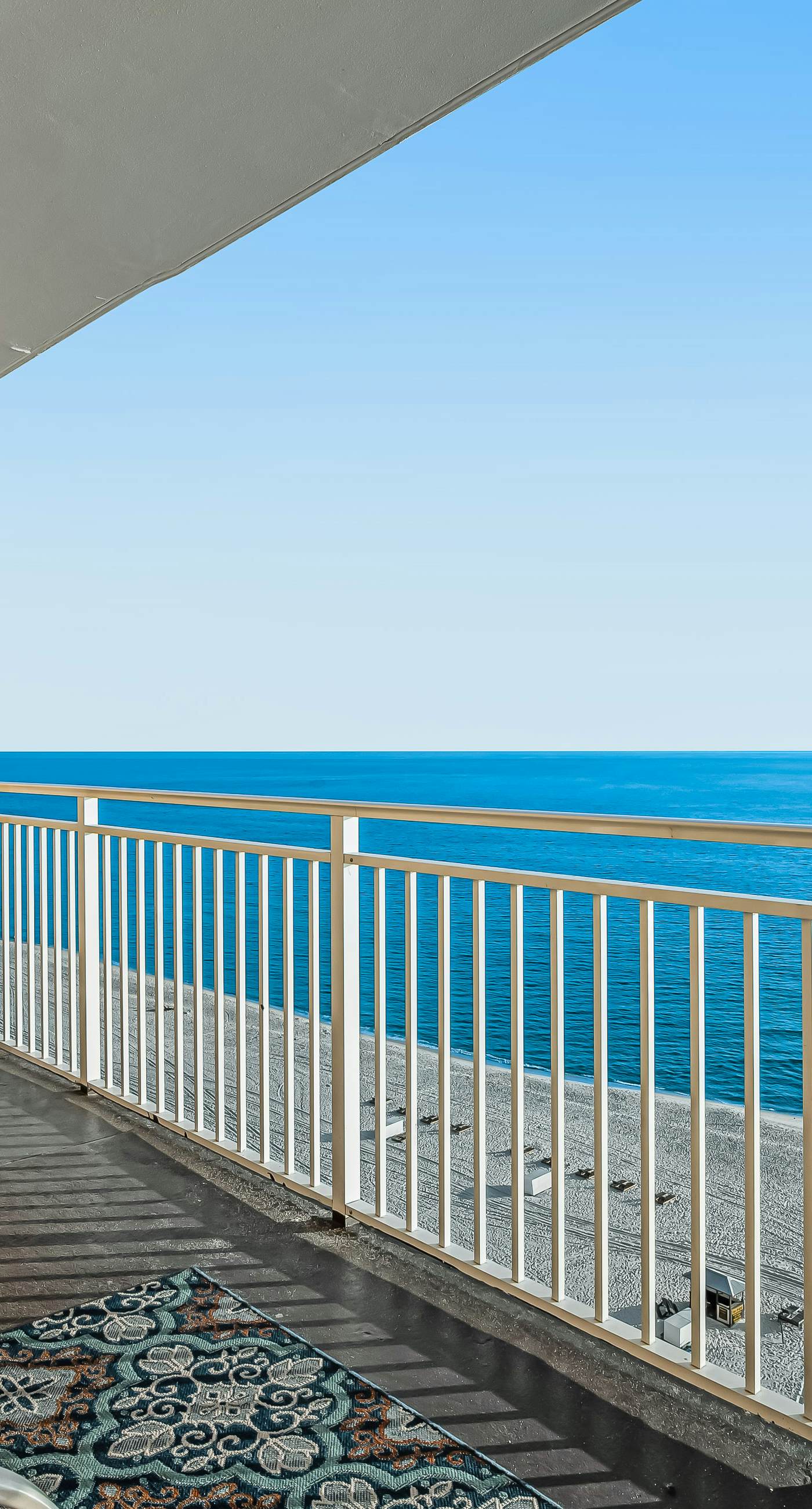 Snow-bird friendly condo with pool & fitness room - walk right out to the sand