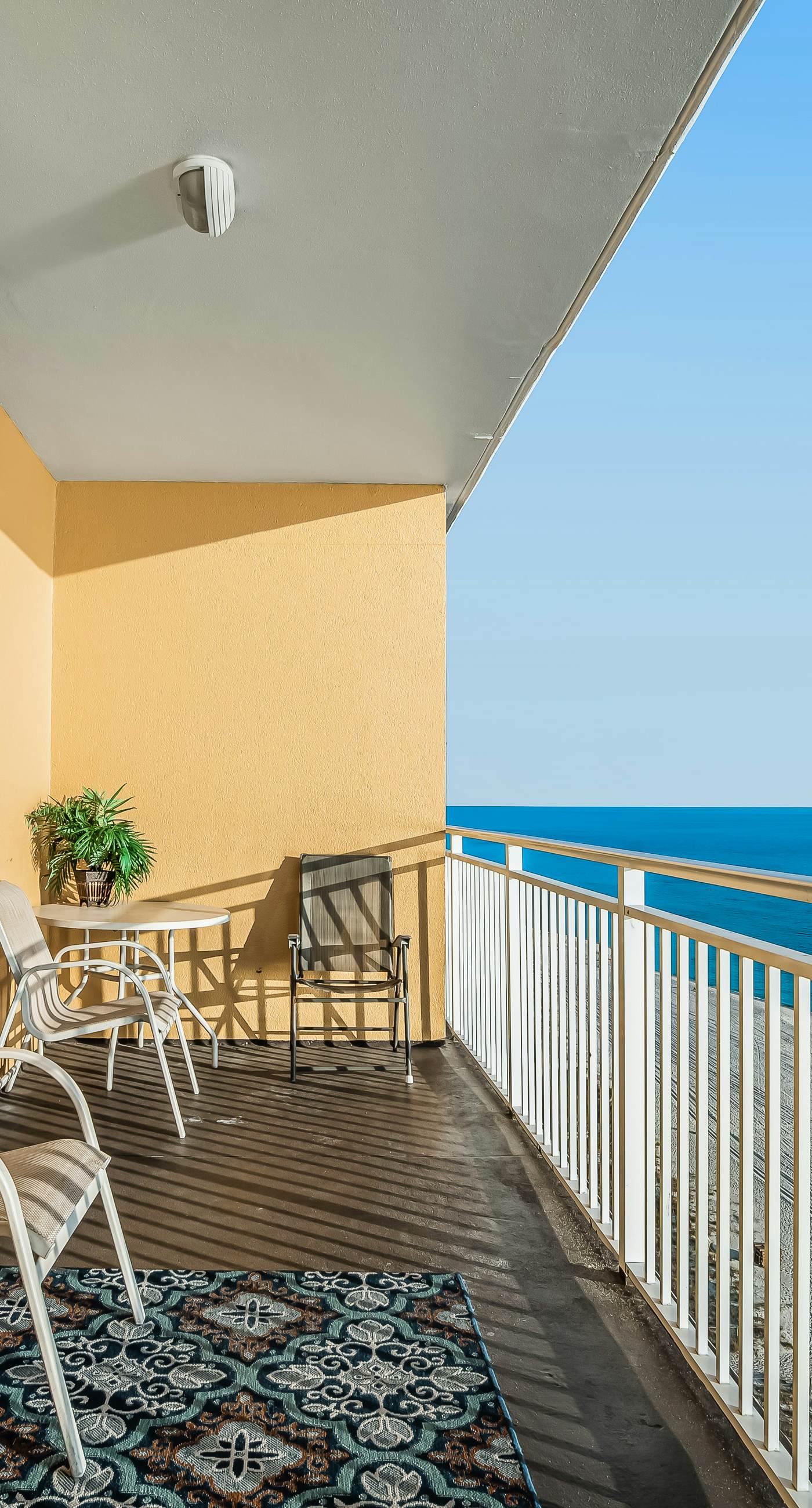 Snow-bird friendly condo with pool & fitness room - walk right out to the sand