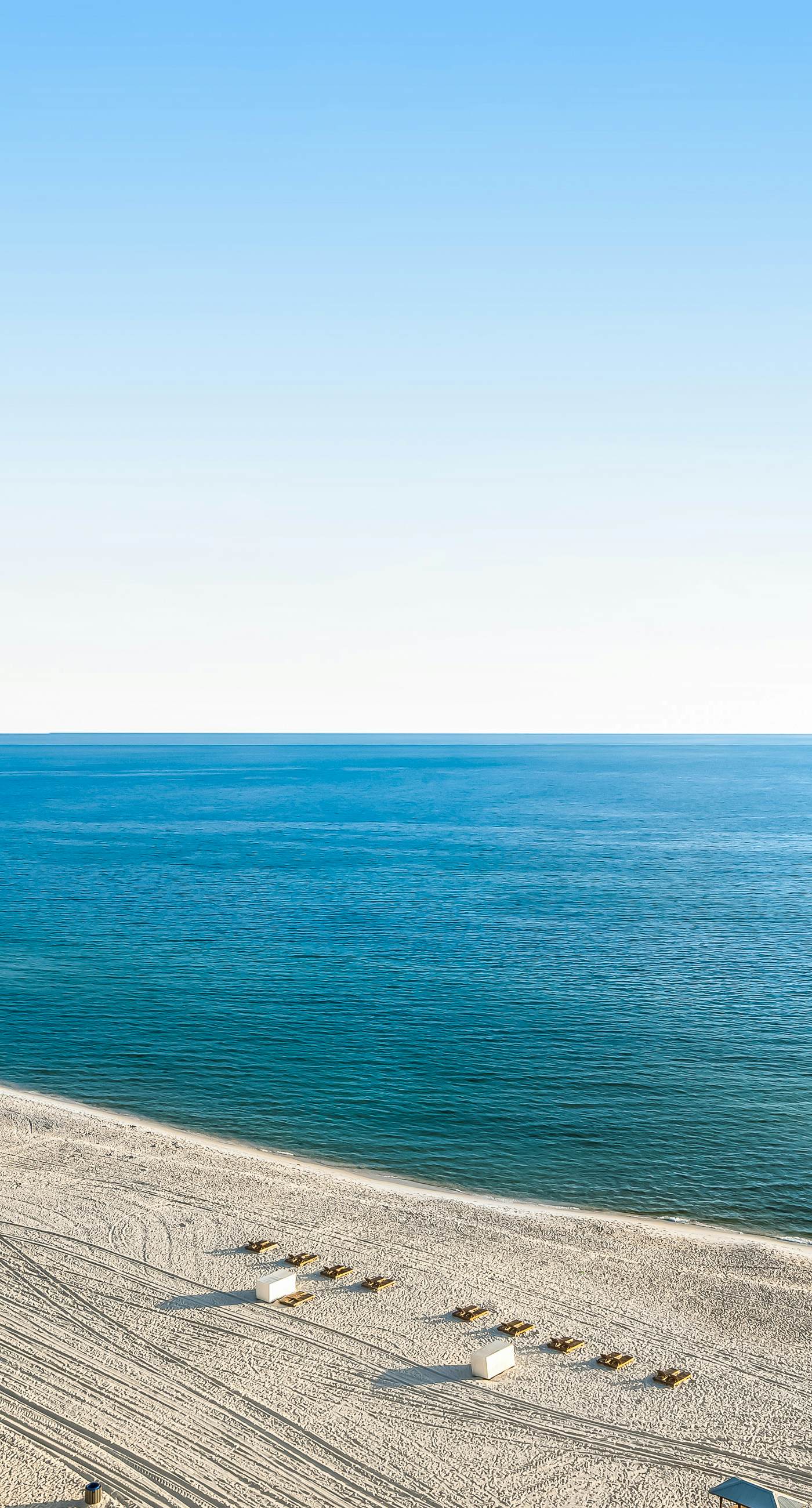 Snow-bird friendly condo with pool & fitness room - walk right out to the sand