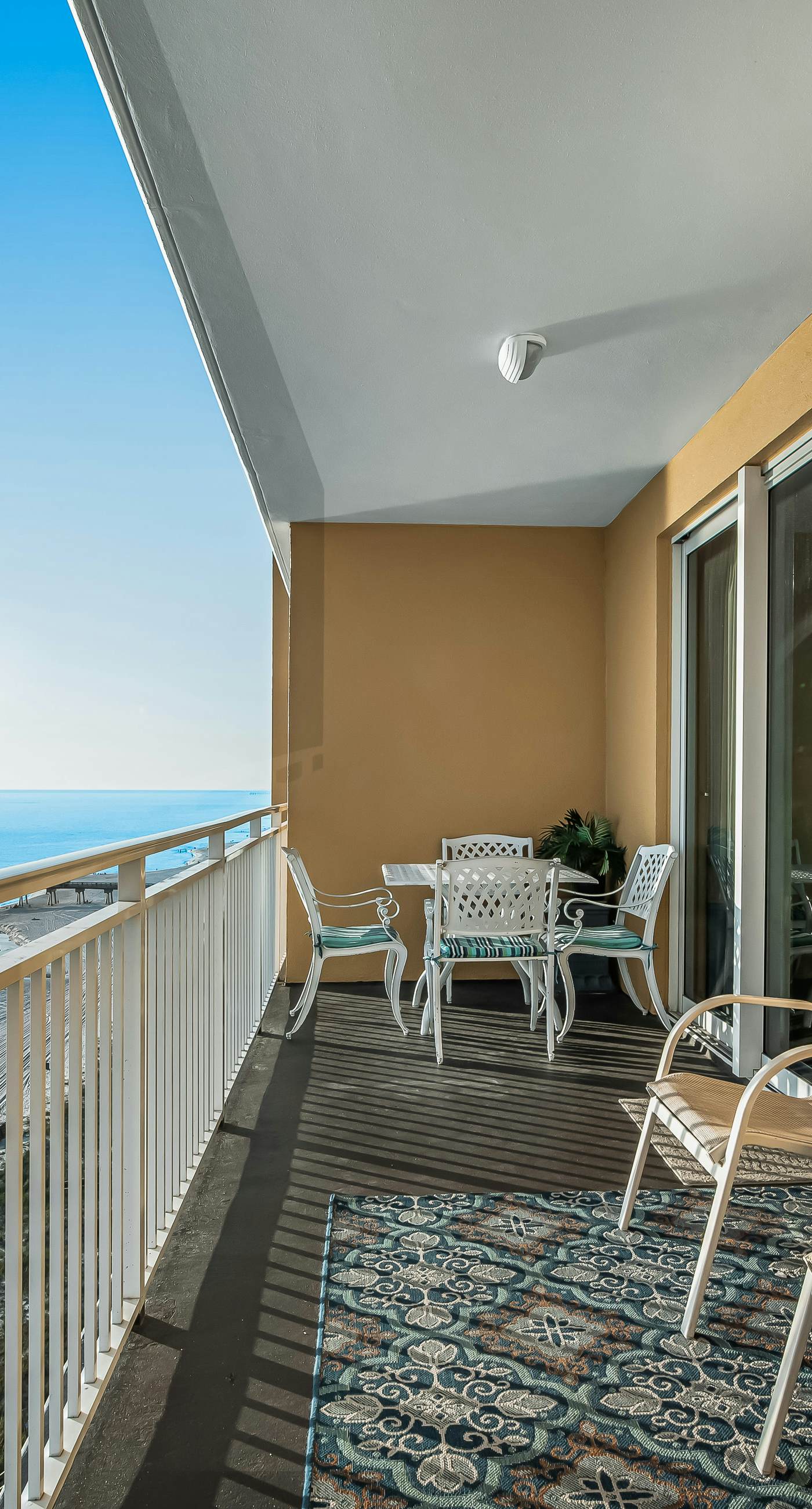 Snow-bird friendly condo with pool & fitness room - walk right out to the sand