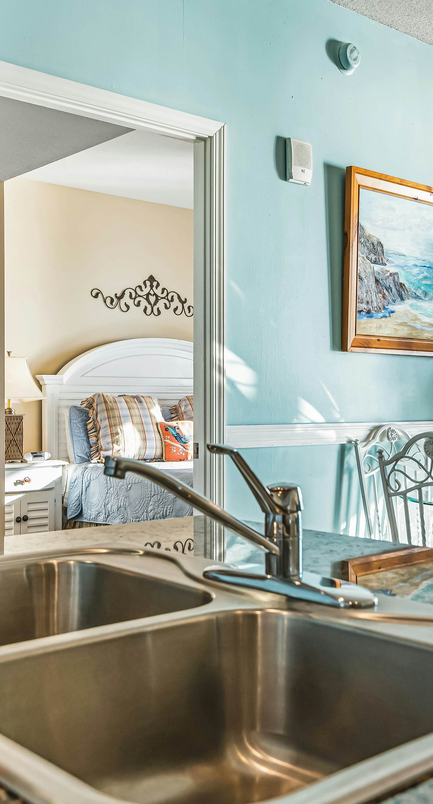 Snow-bird friendly condo with pool & fitness room - walk right out to the sand