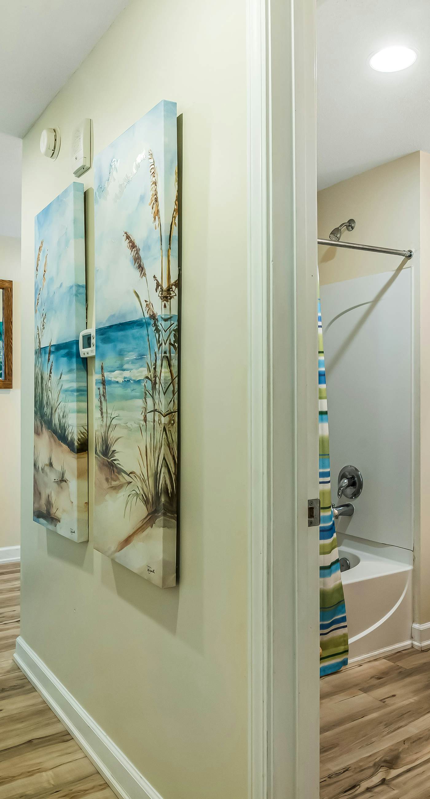 Snow-bird friendly condo with pool & fitness room - walk right out to the sand