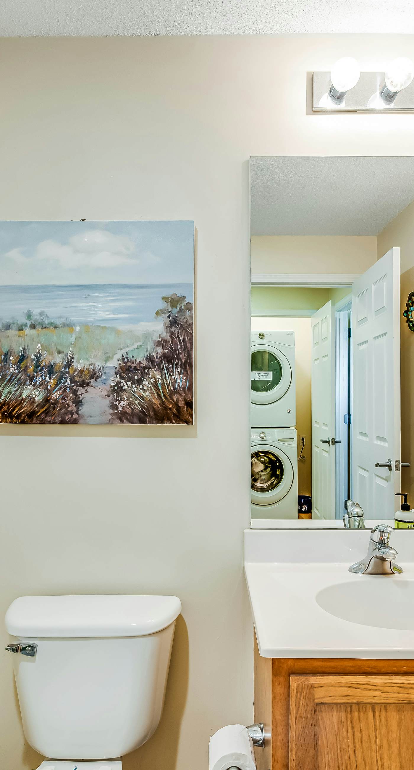 Snow-bird friendly condo with pool & fitness room - walk right out to the sand