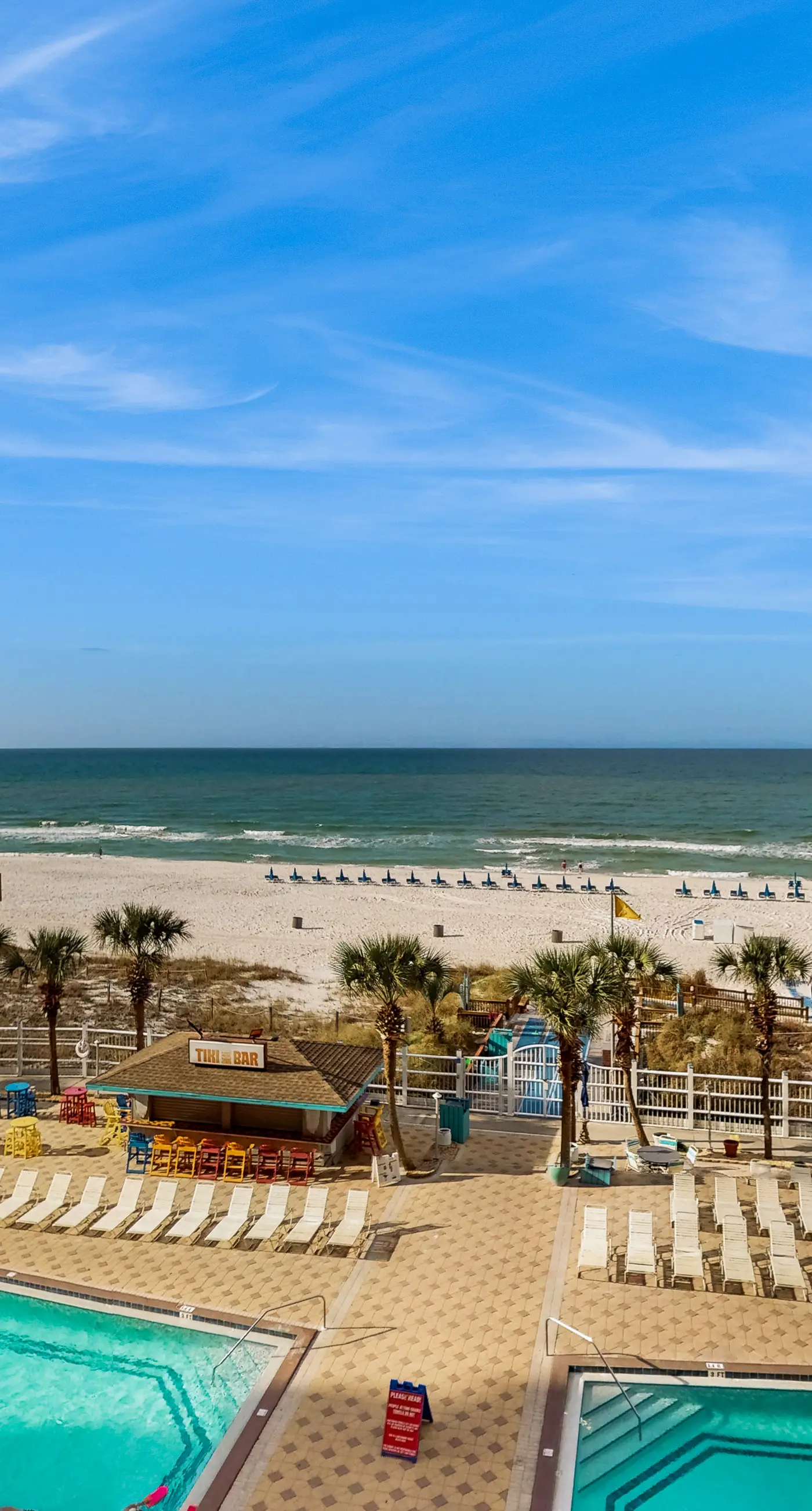 Cozy beachfront condo with private balcony, shared pool & beach access