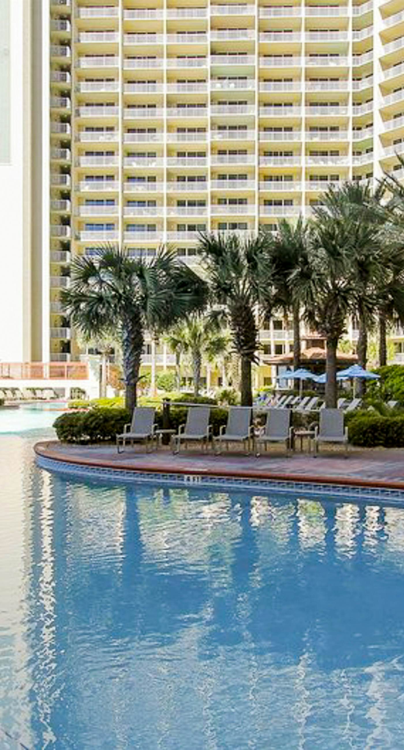 Lovely condo on Gulf with beach, pools, hot tub, & balcony