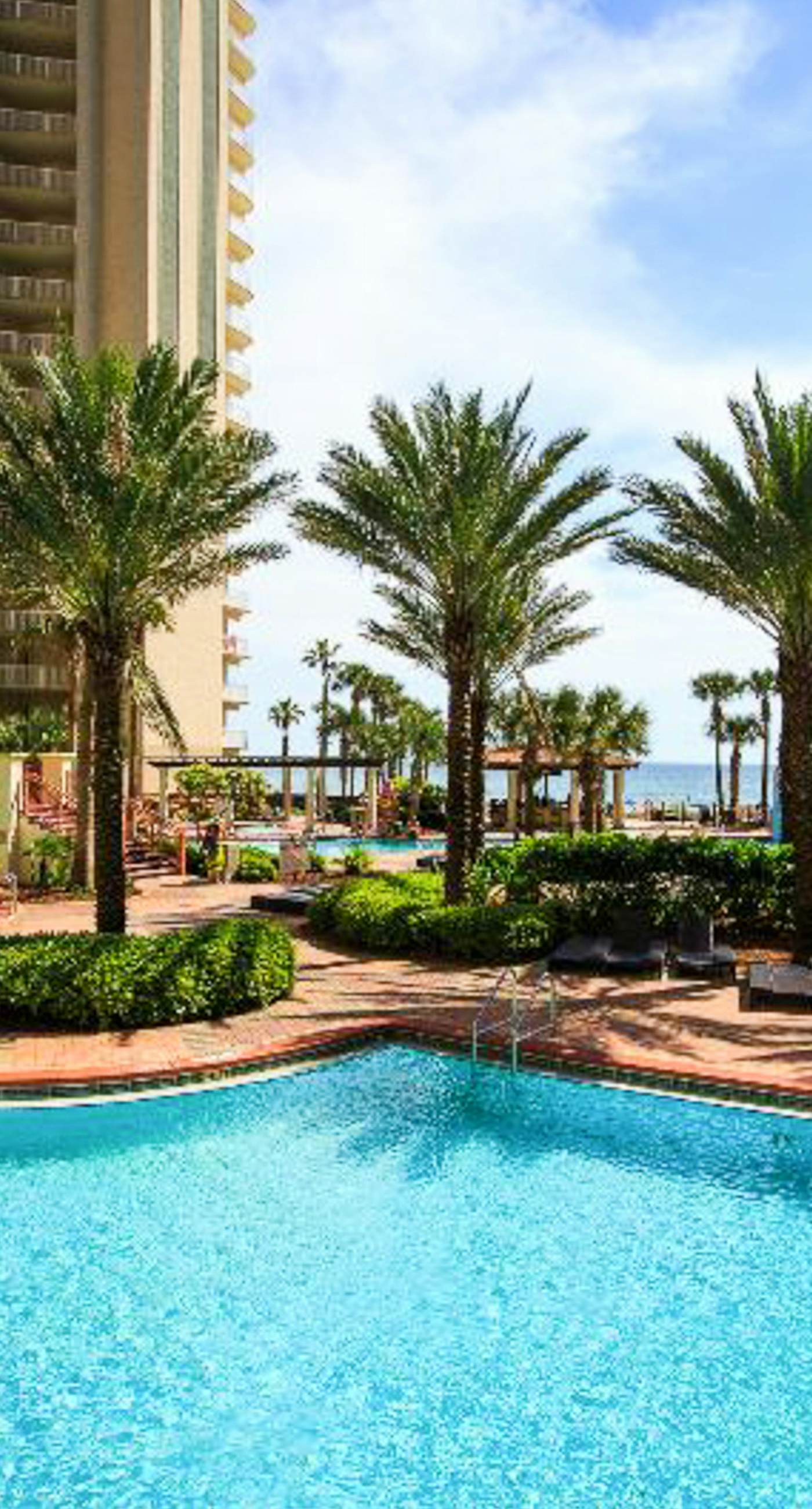 Lovely condo on Gulf with beach, pools, hot tub, & balcony