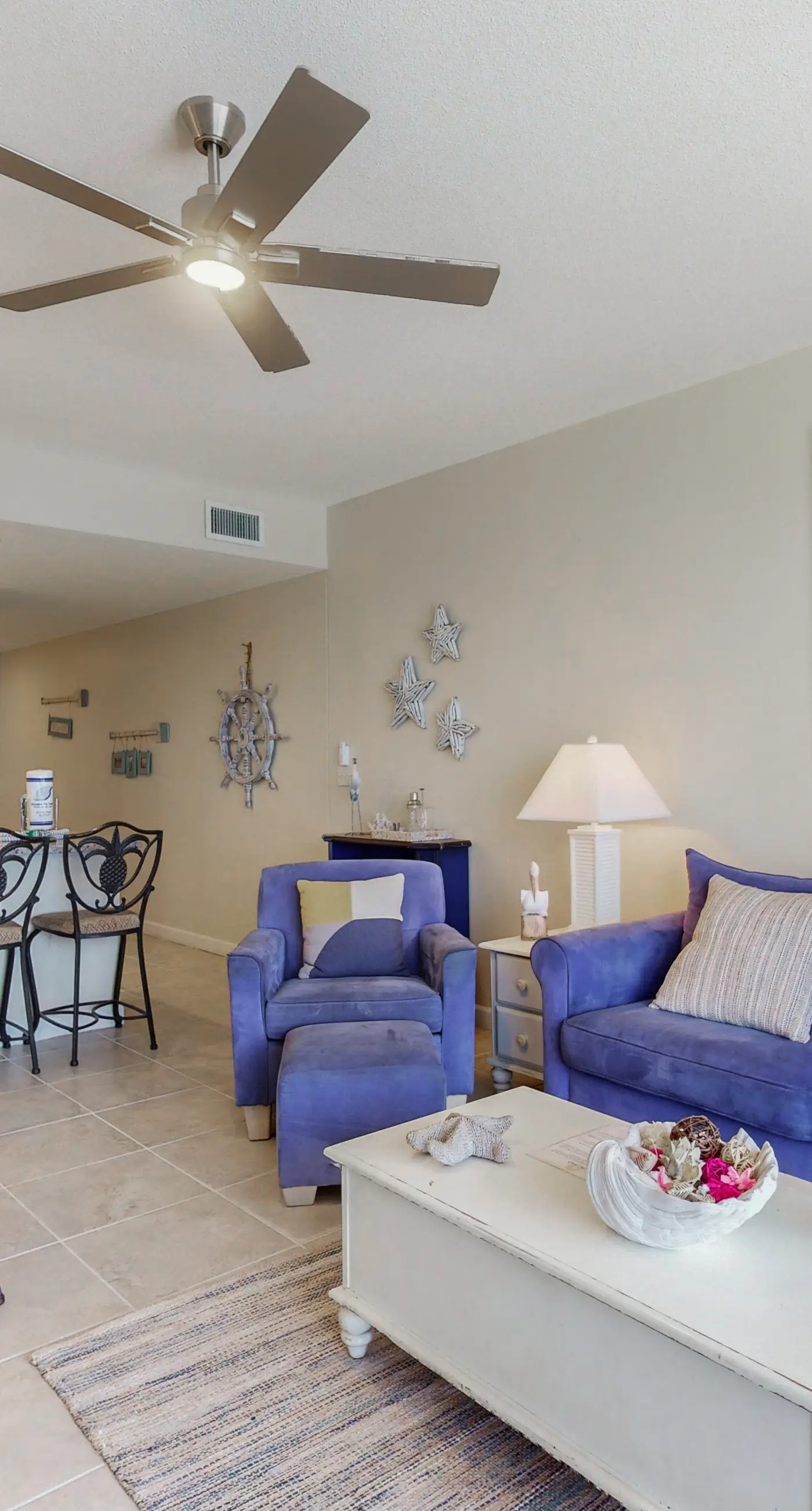 Charming, beachfront condo with furnished balcony & a bi-level pool