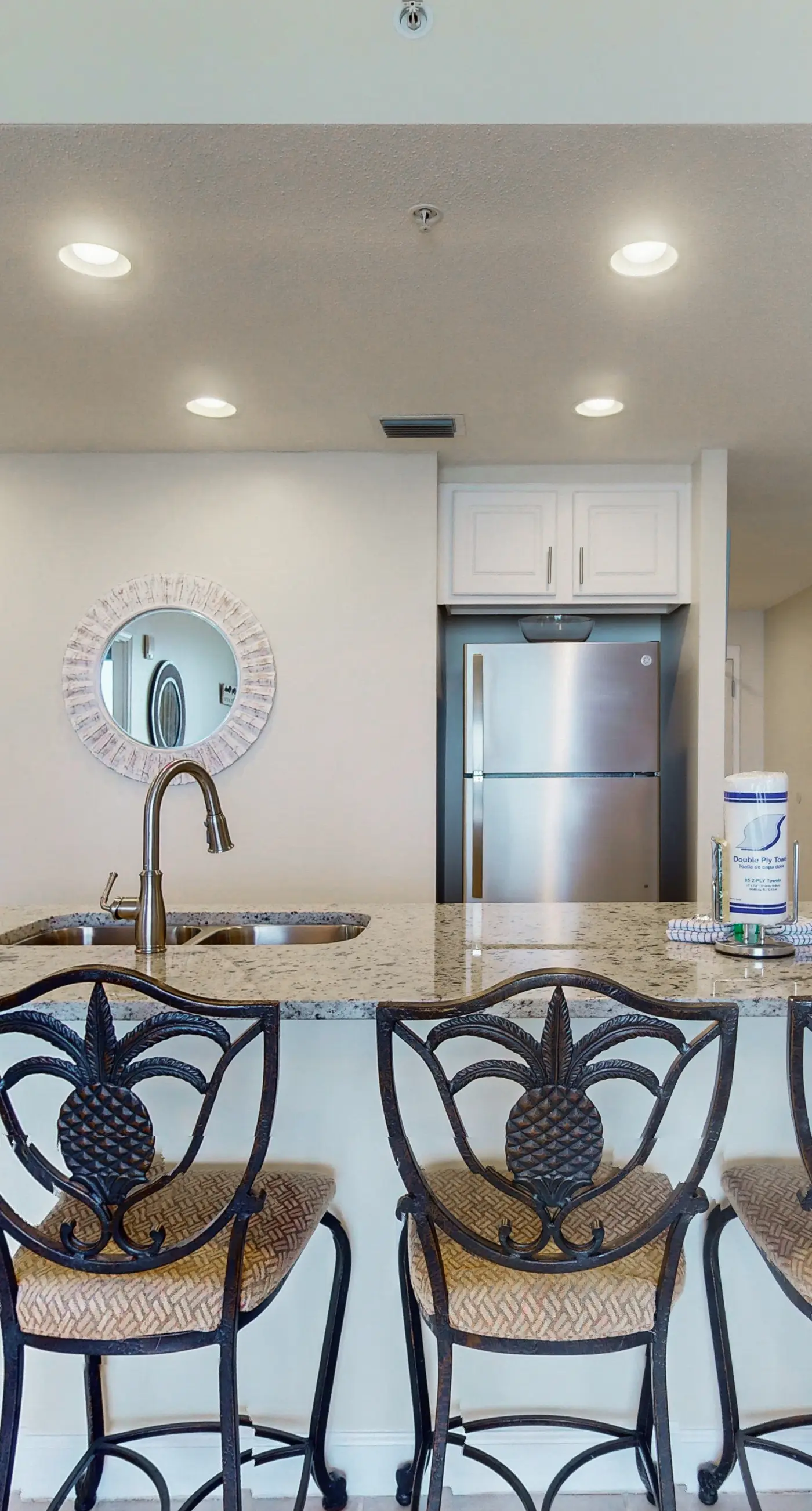 Charming, beachfront condo with furnished balcony & a bi-level pool