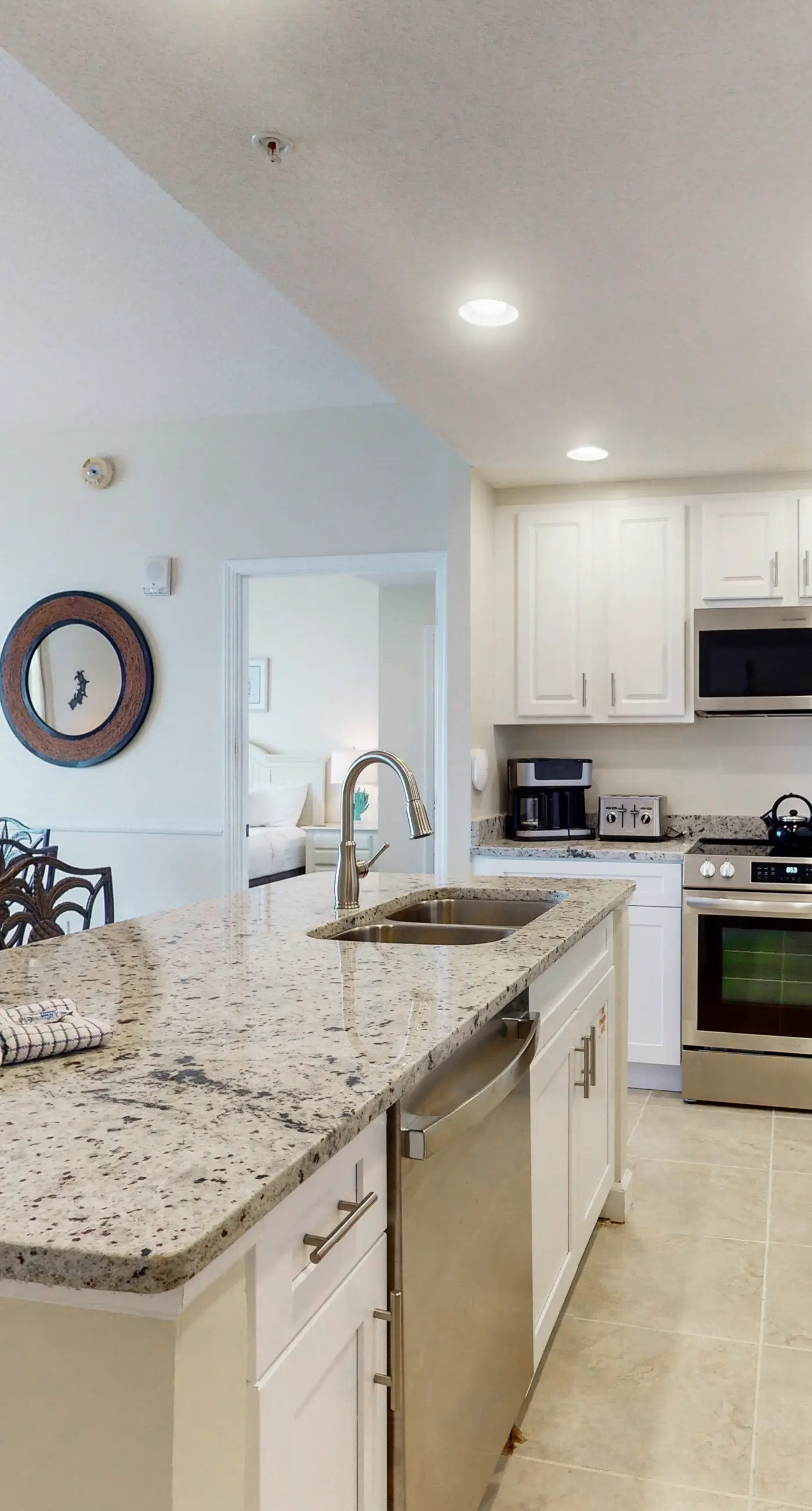 Charming, beachfront condo with furnished balcony & a bi-level pool
