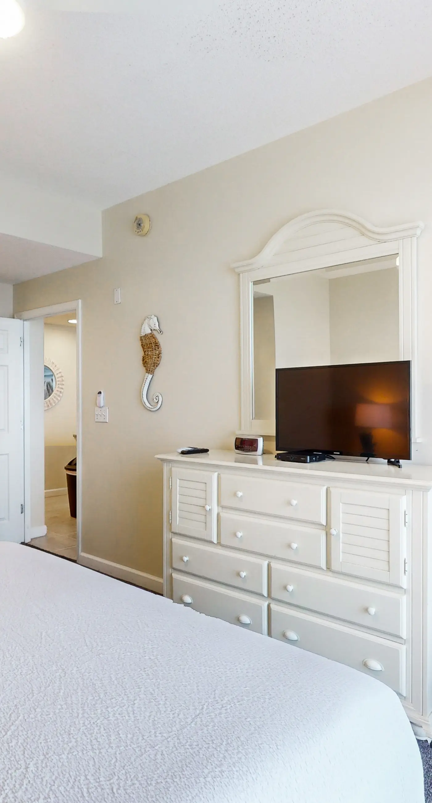 Charming, beachfront condo with furnished balcony & a bi-level pool