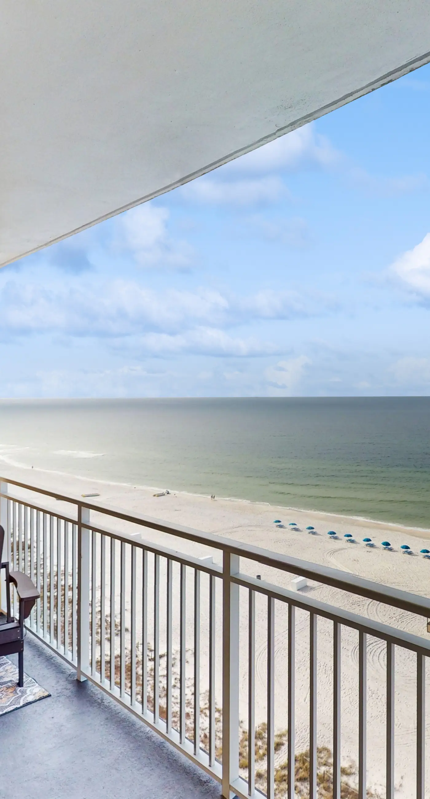 Charming, beachfront condo with furnished balcony & a bi-level pool