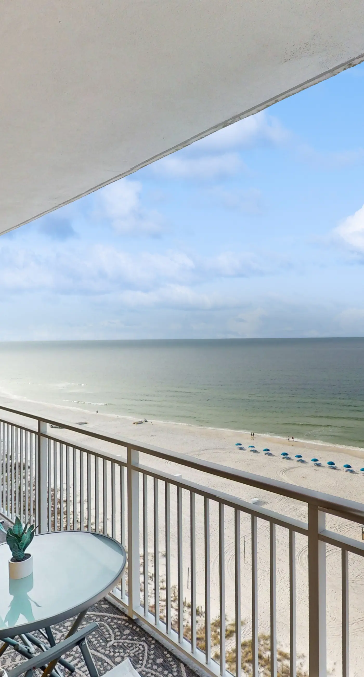 Charming, beachfront condo with furnished balcony & a bi-level pool