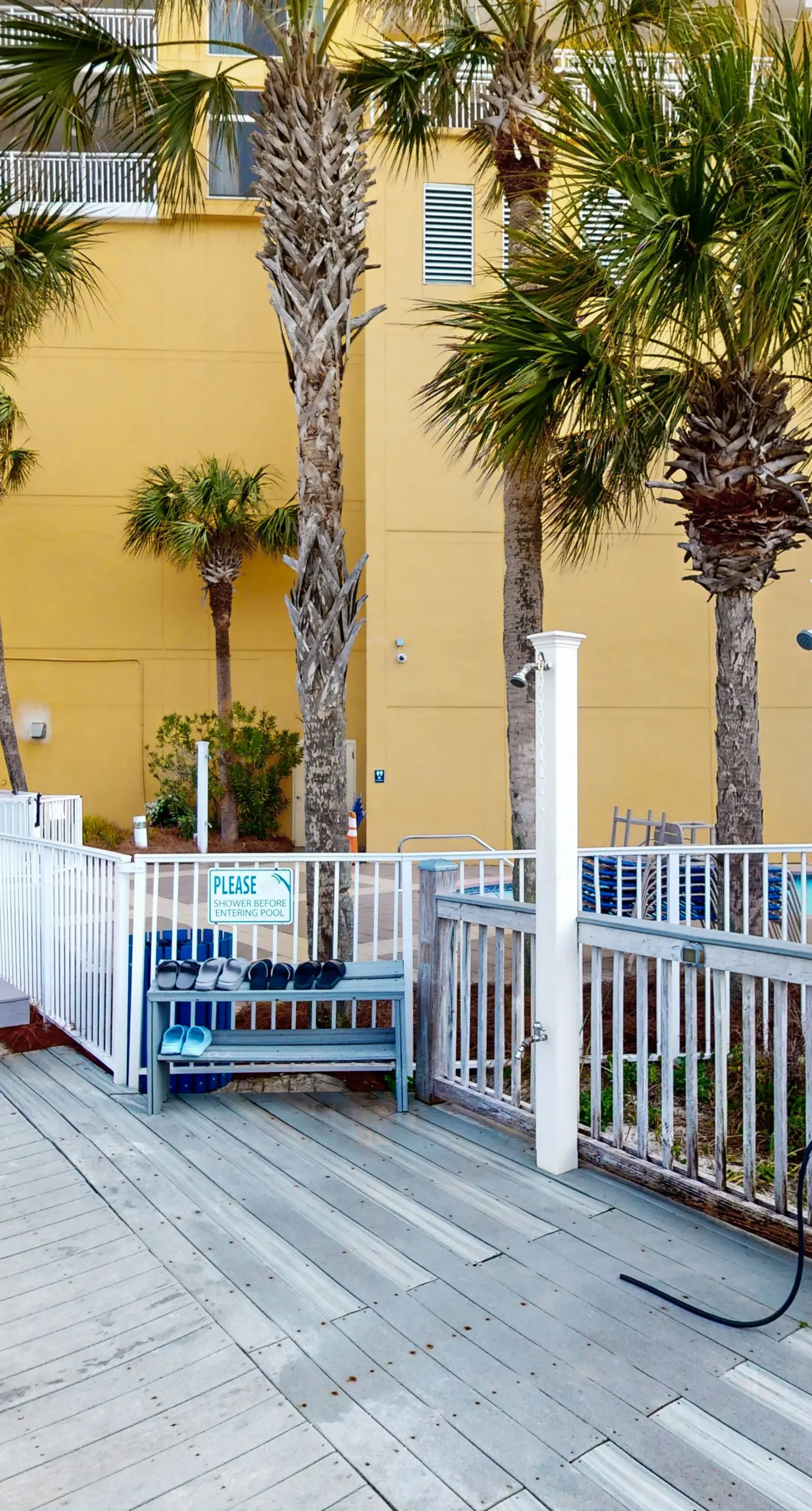 Charming, beachfront condo with furnished balcony & a bi-level pool